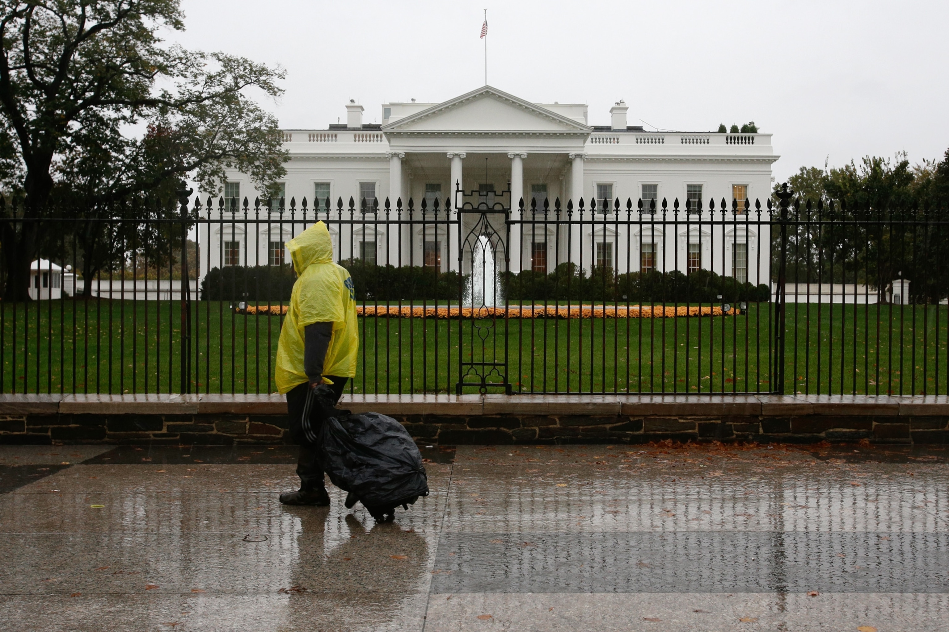 a man in front of the White House