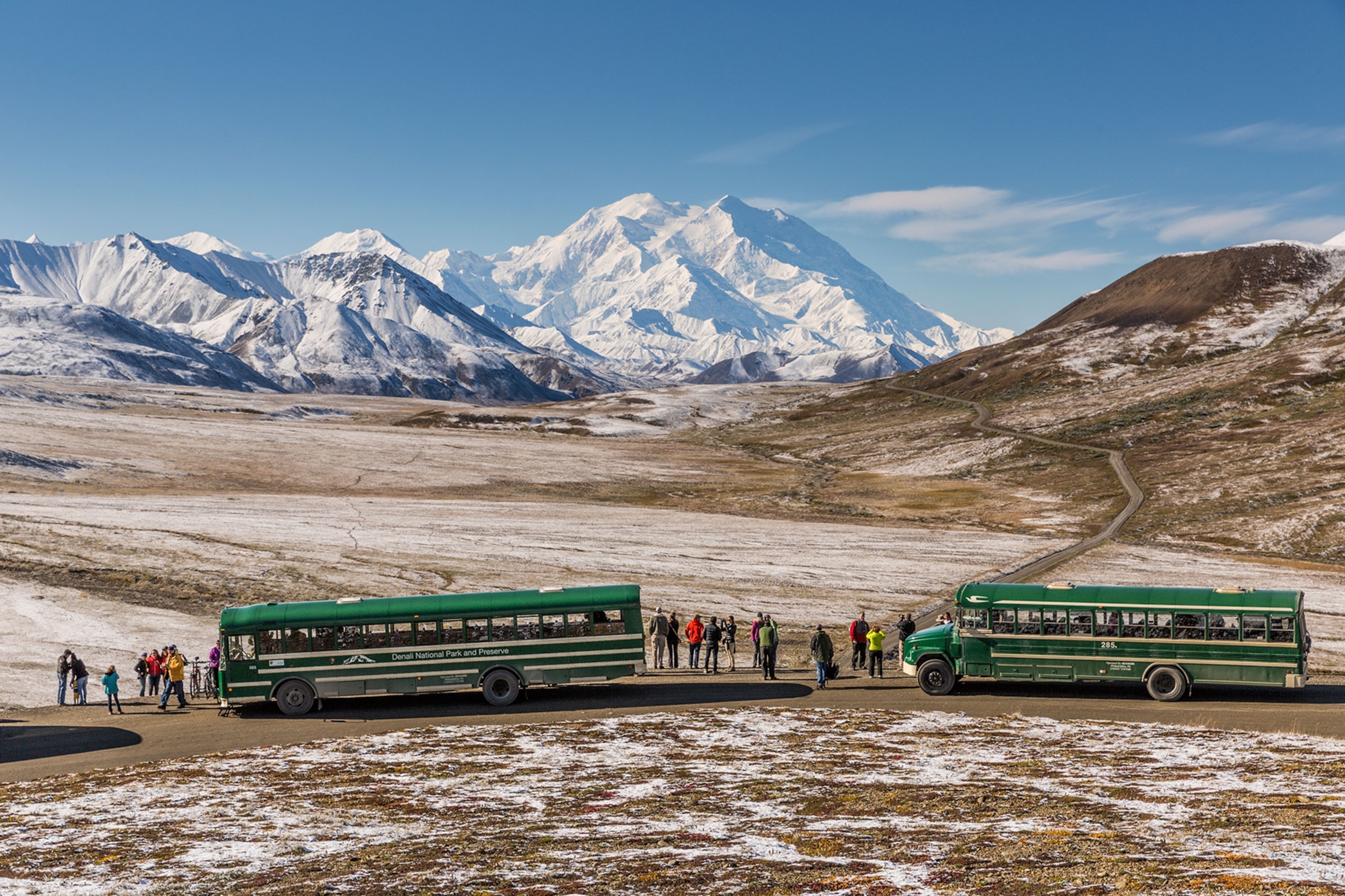 tourist photograph the first Fall snow on Mt. McKinley in Denali National Park