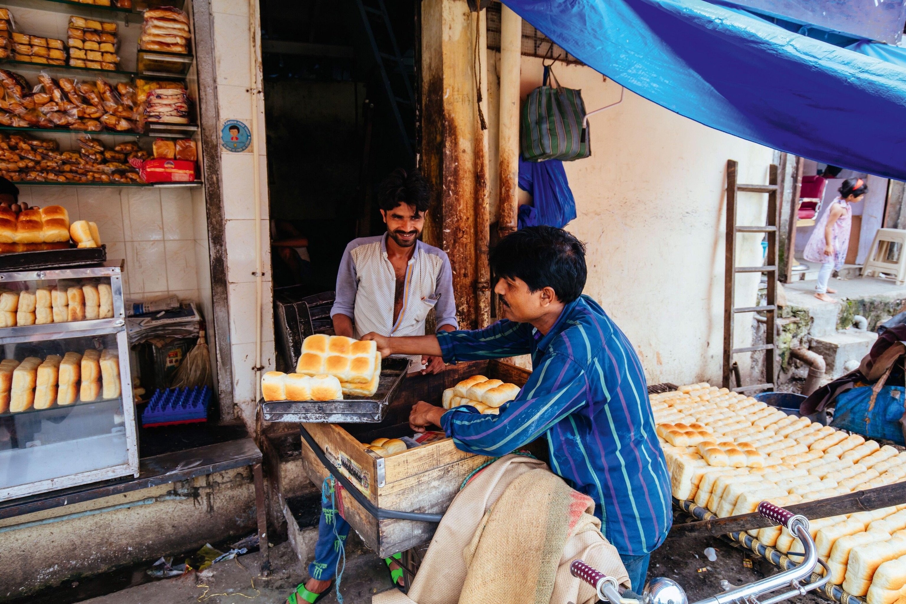 Two sellers at Colaba Causeway Market.