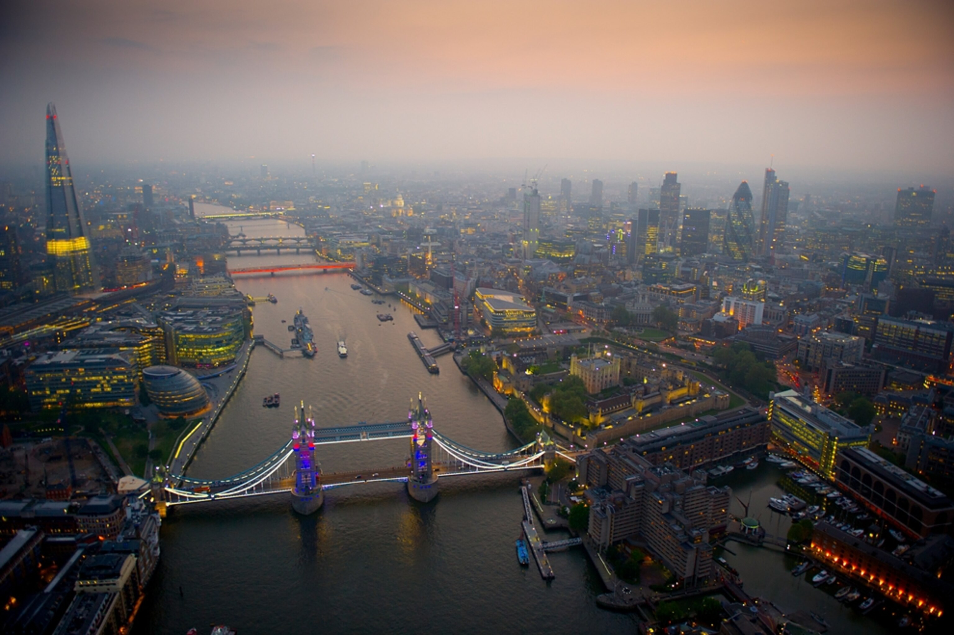 an aerial view of London at dusk