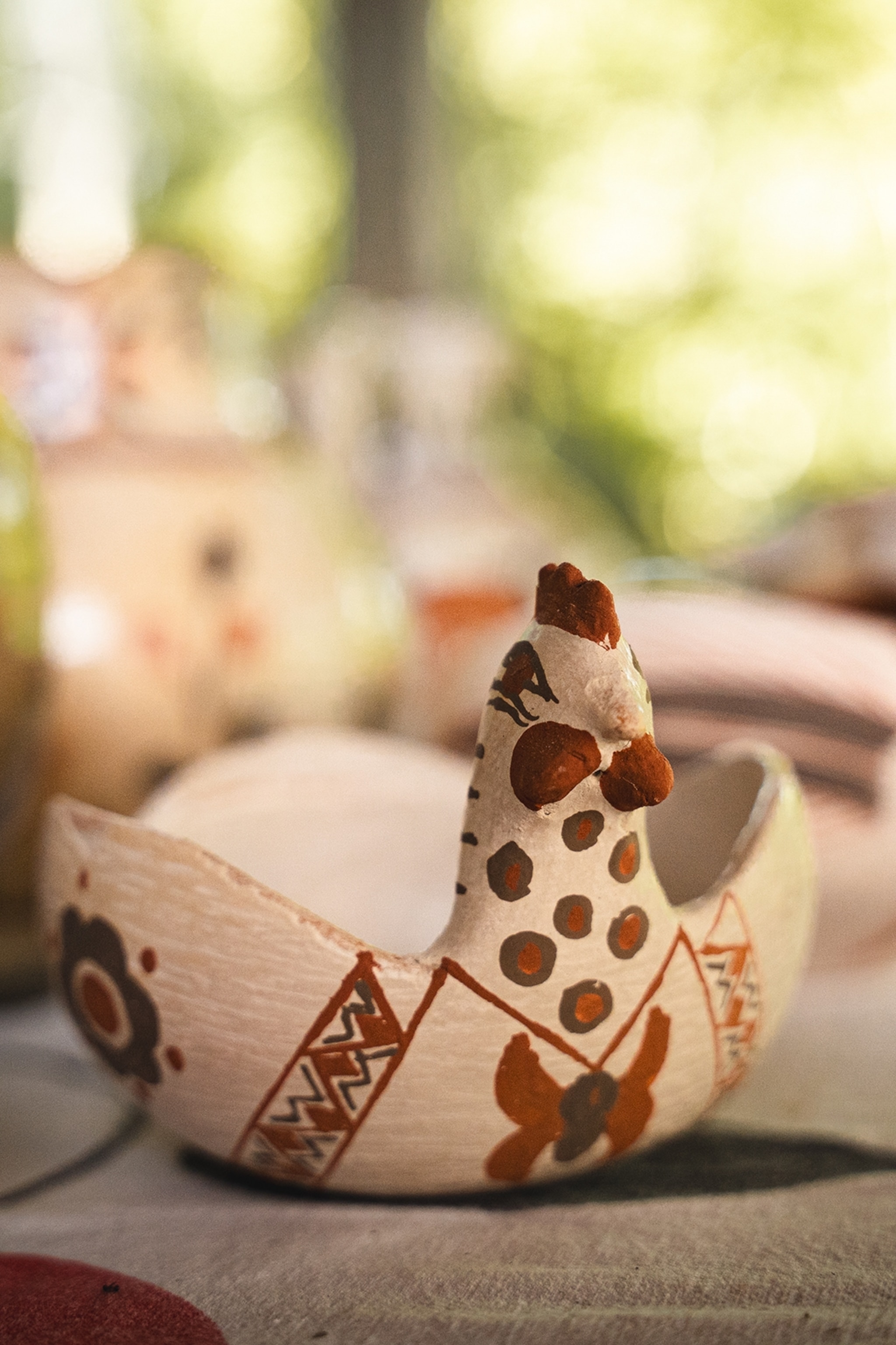 A hand-carved bowl in the shape of a coquerel.