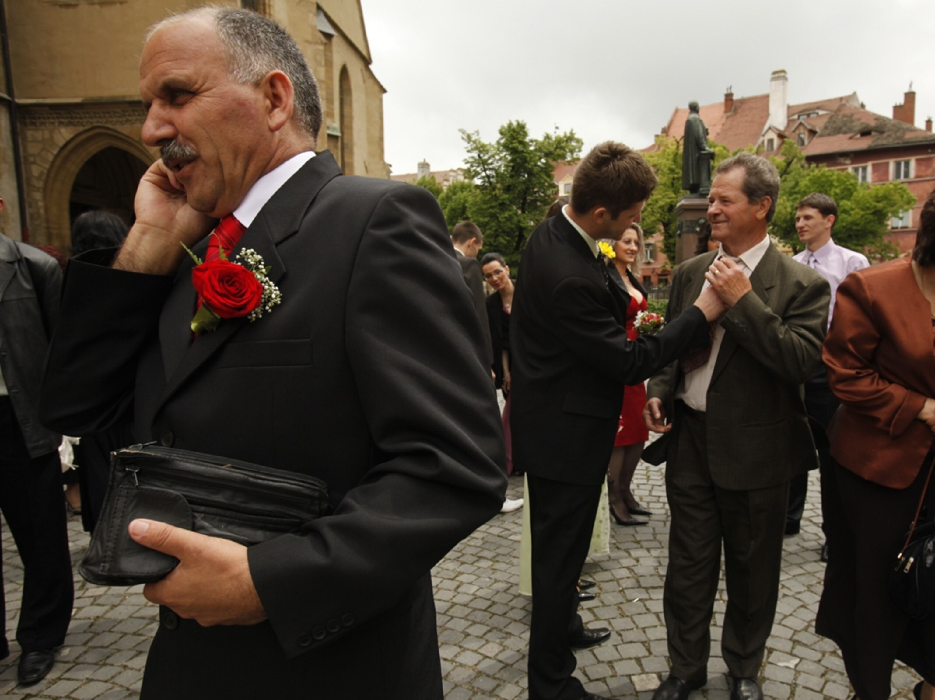 Wedding party in front of Evangelical Cathedral in Sibiu