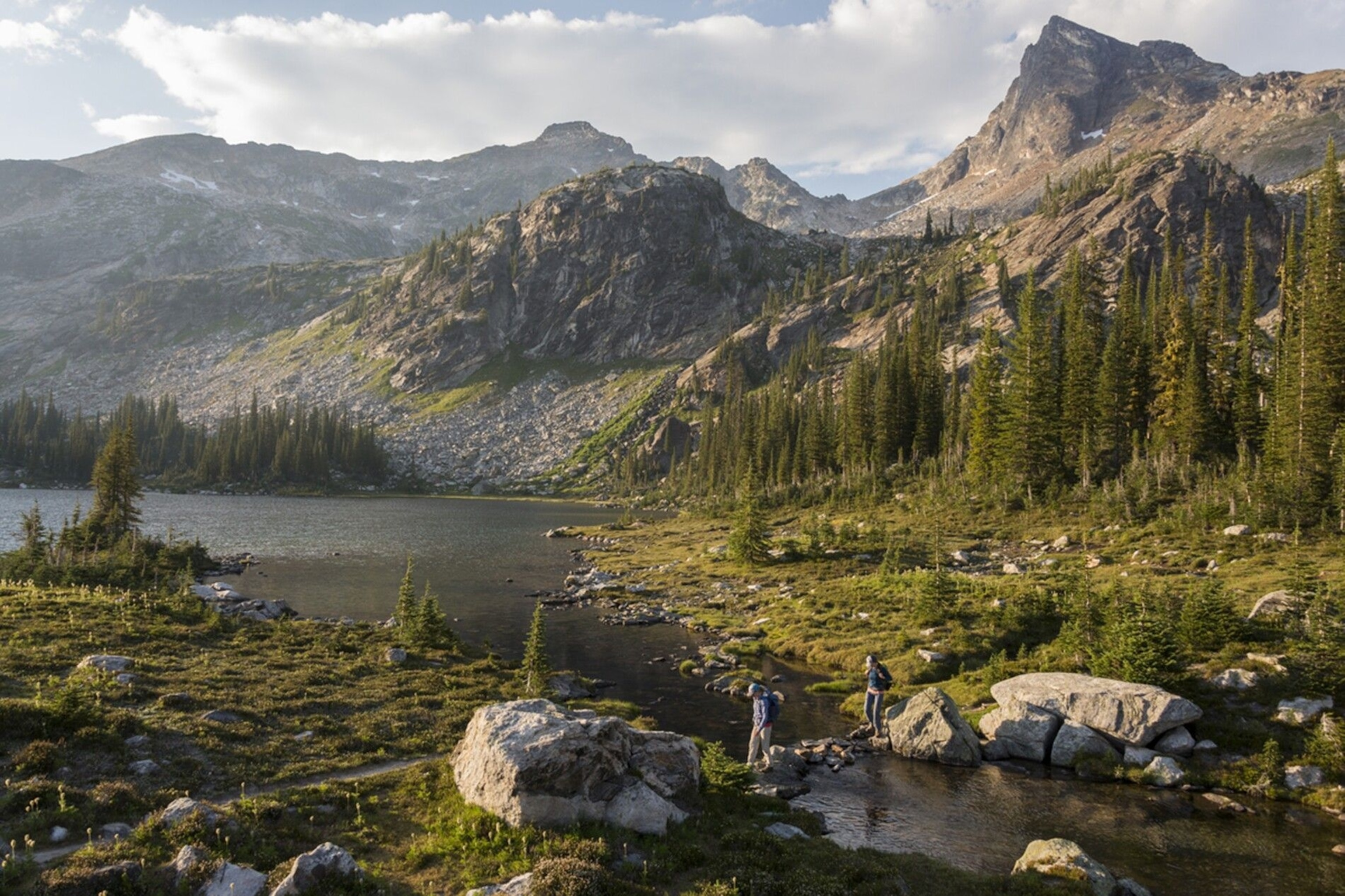 Hikers at Gillim Lakes in Valhalla Provincial Park, a natural playground encompassing 49,893 hectares of raw wilderness.