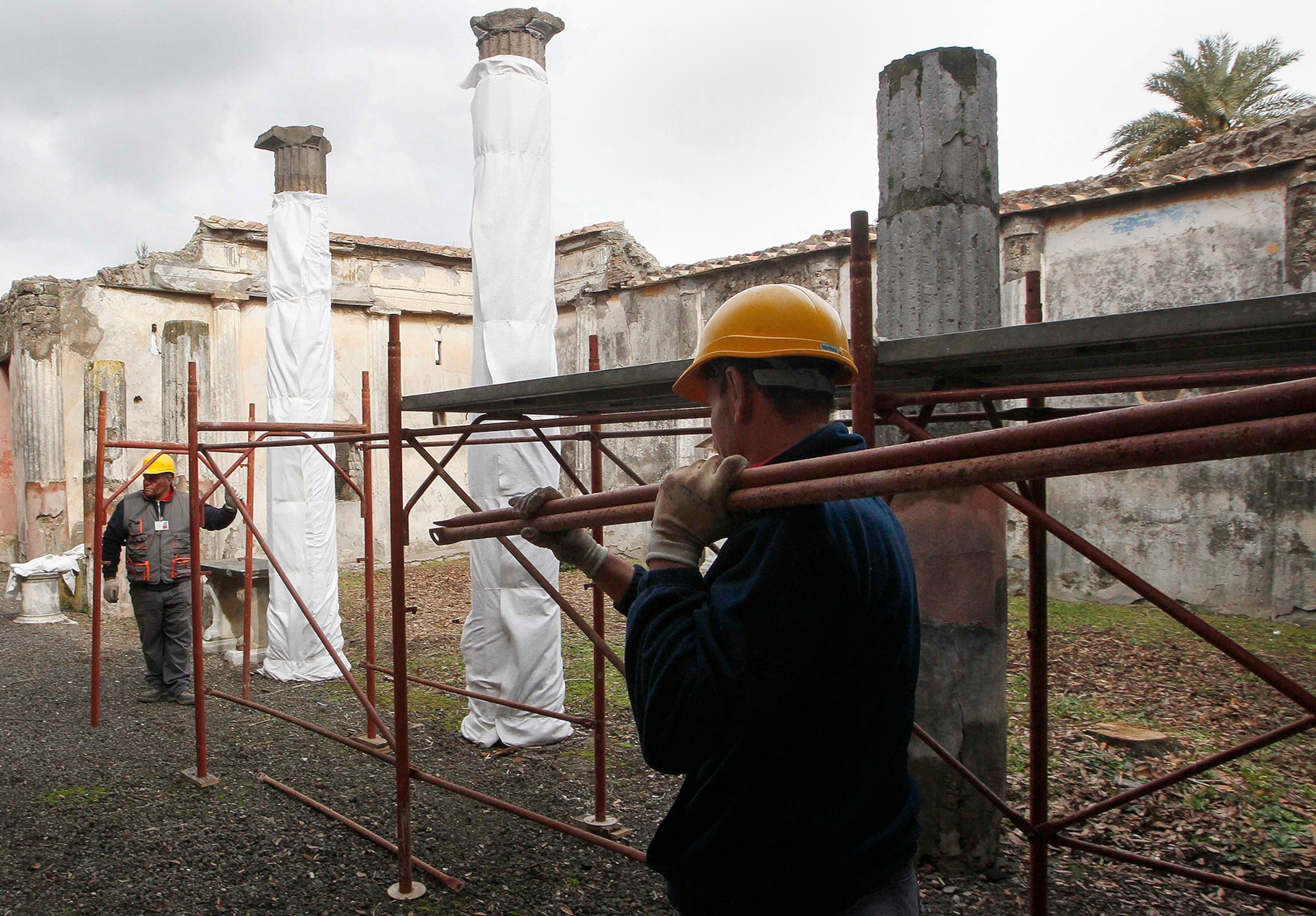 Pompeii ruins with Mount Vesuvius in the background.