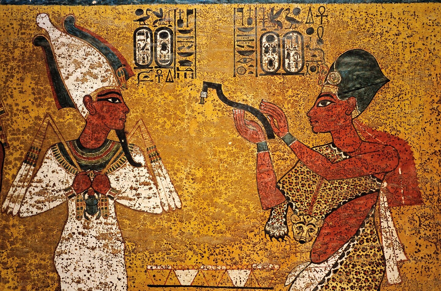On the north wall of Tut&rsquo;s tomb is a depiction of Tutankhamun&rsquo;s successor, Aye, right, performing the Opening of the Mouth ceremony on Tut, shown as the god Osiris, left.