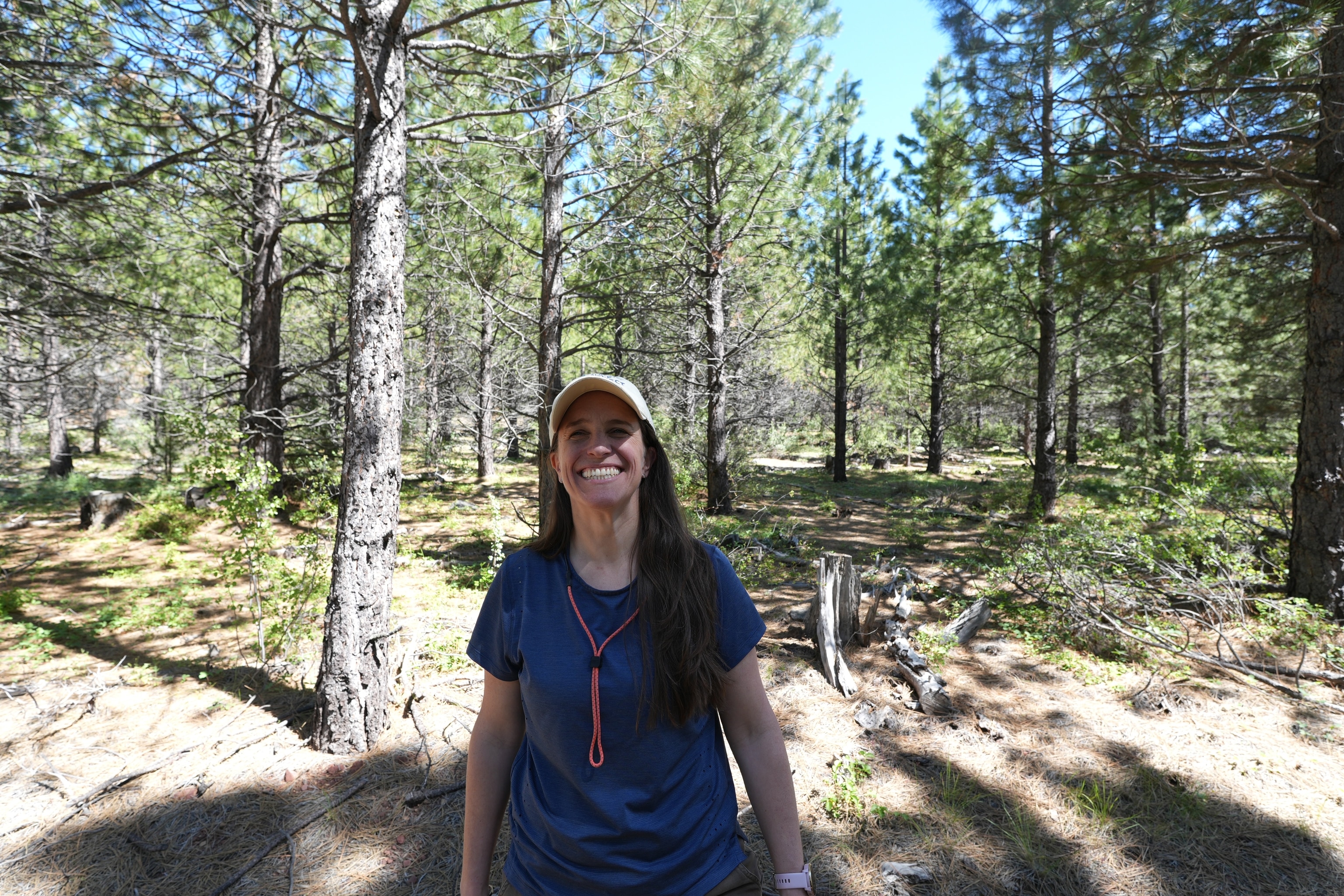 Orrick at a typical gray wolf rendezvous site in Siskiyou County, California.