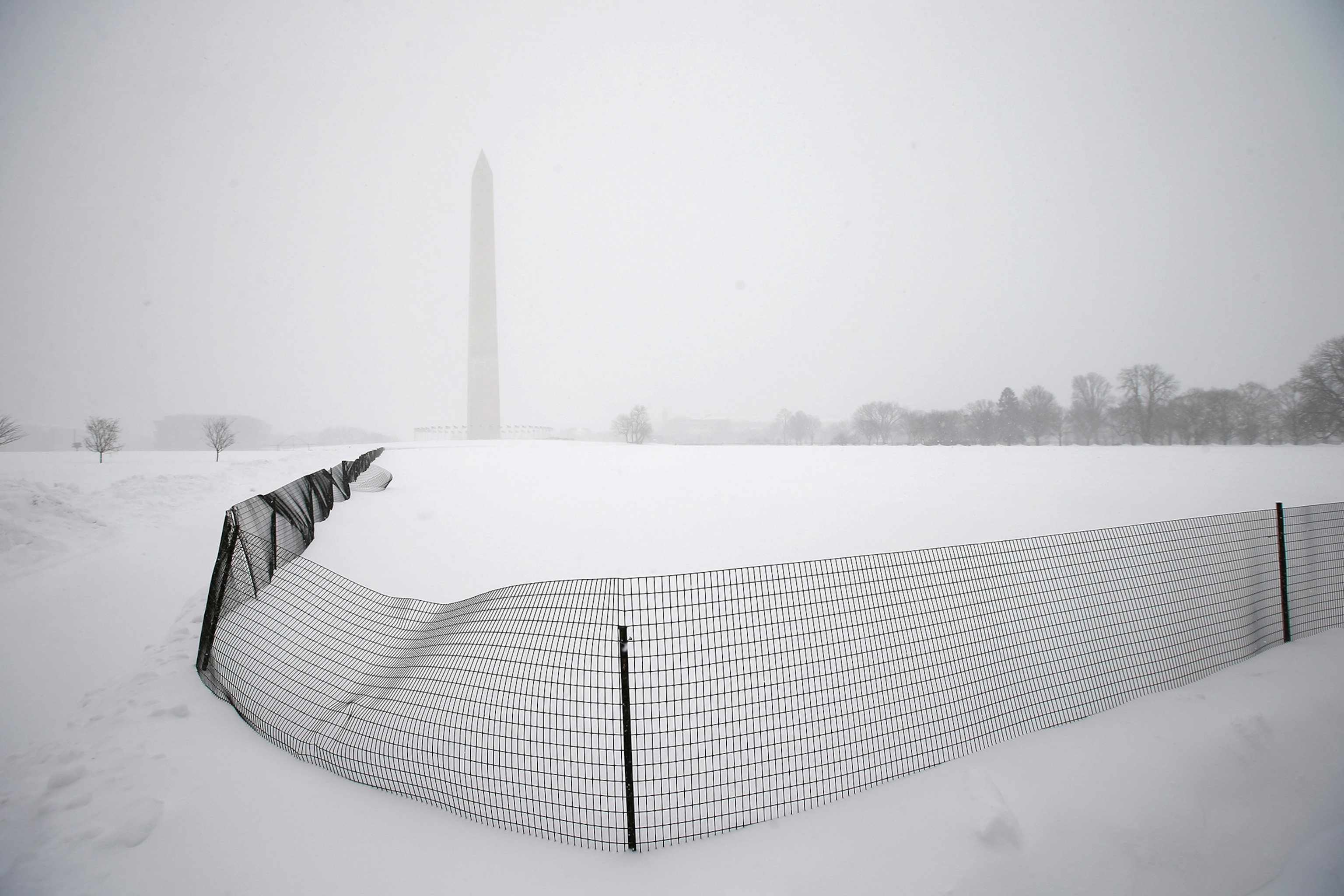 Washington Monument is seen in the snow