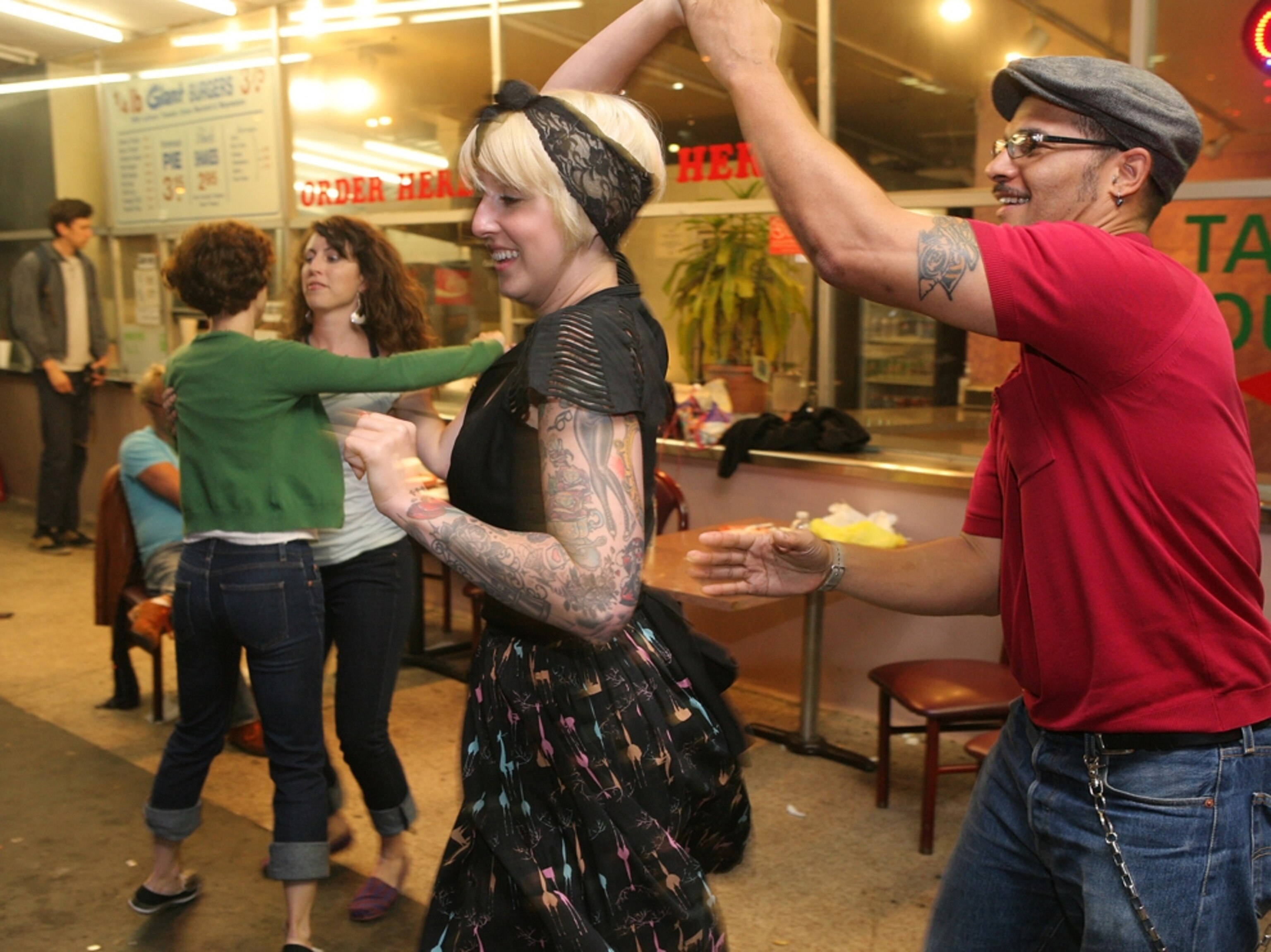 couples dancing in uptown Oakland