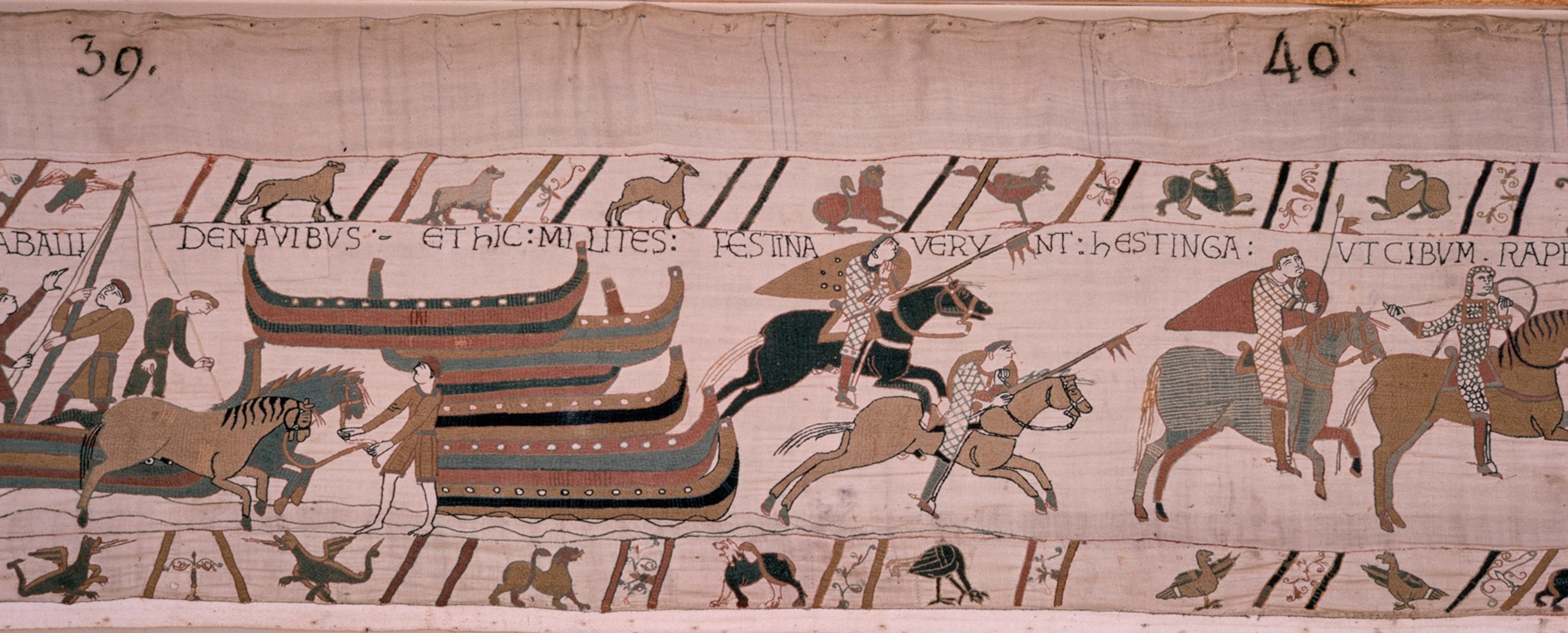 A scene from the tapestry in which Norman invaders arrive on shore.