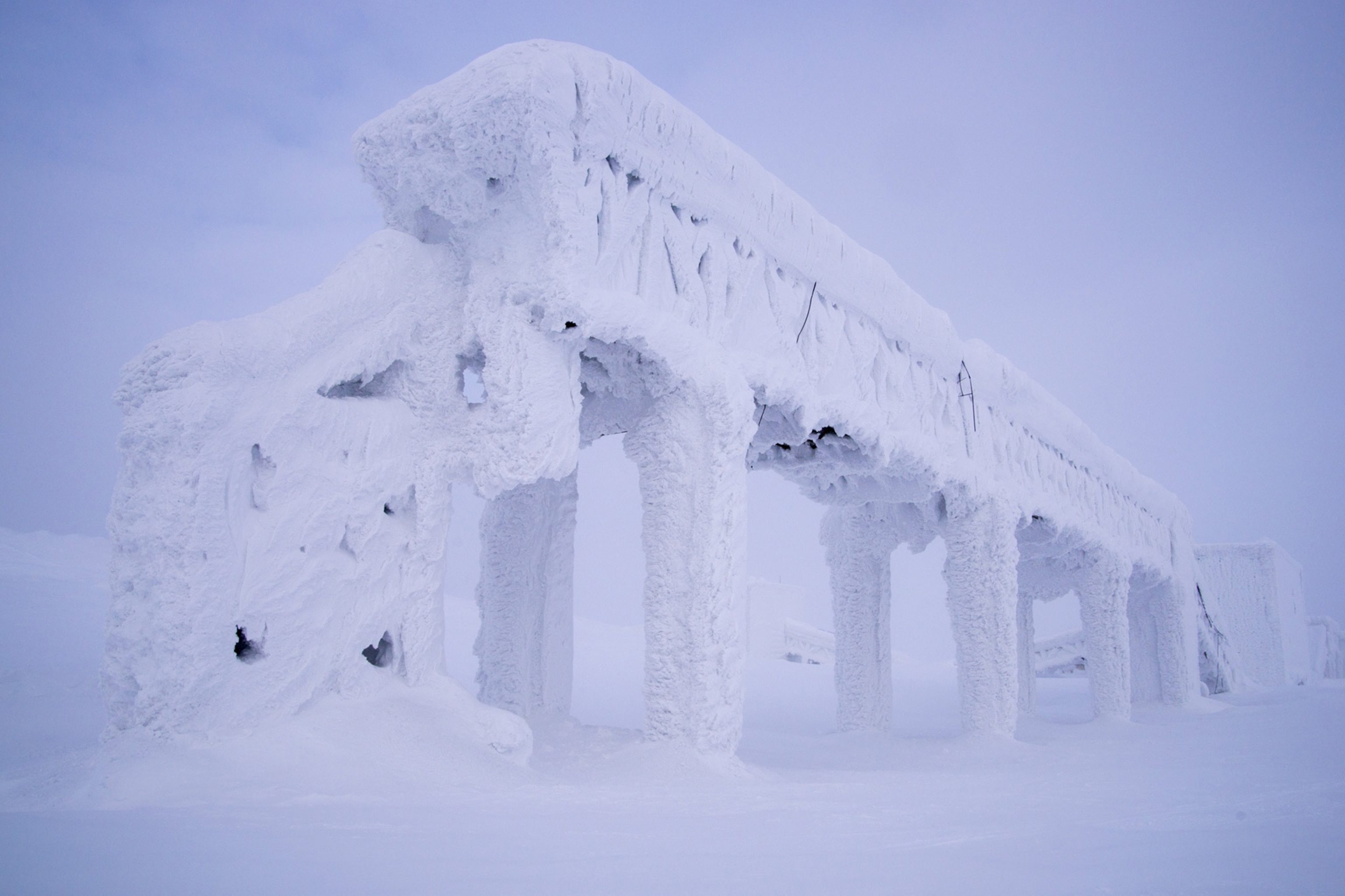 a snow covered bridge on the Kola peninsula, Russia