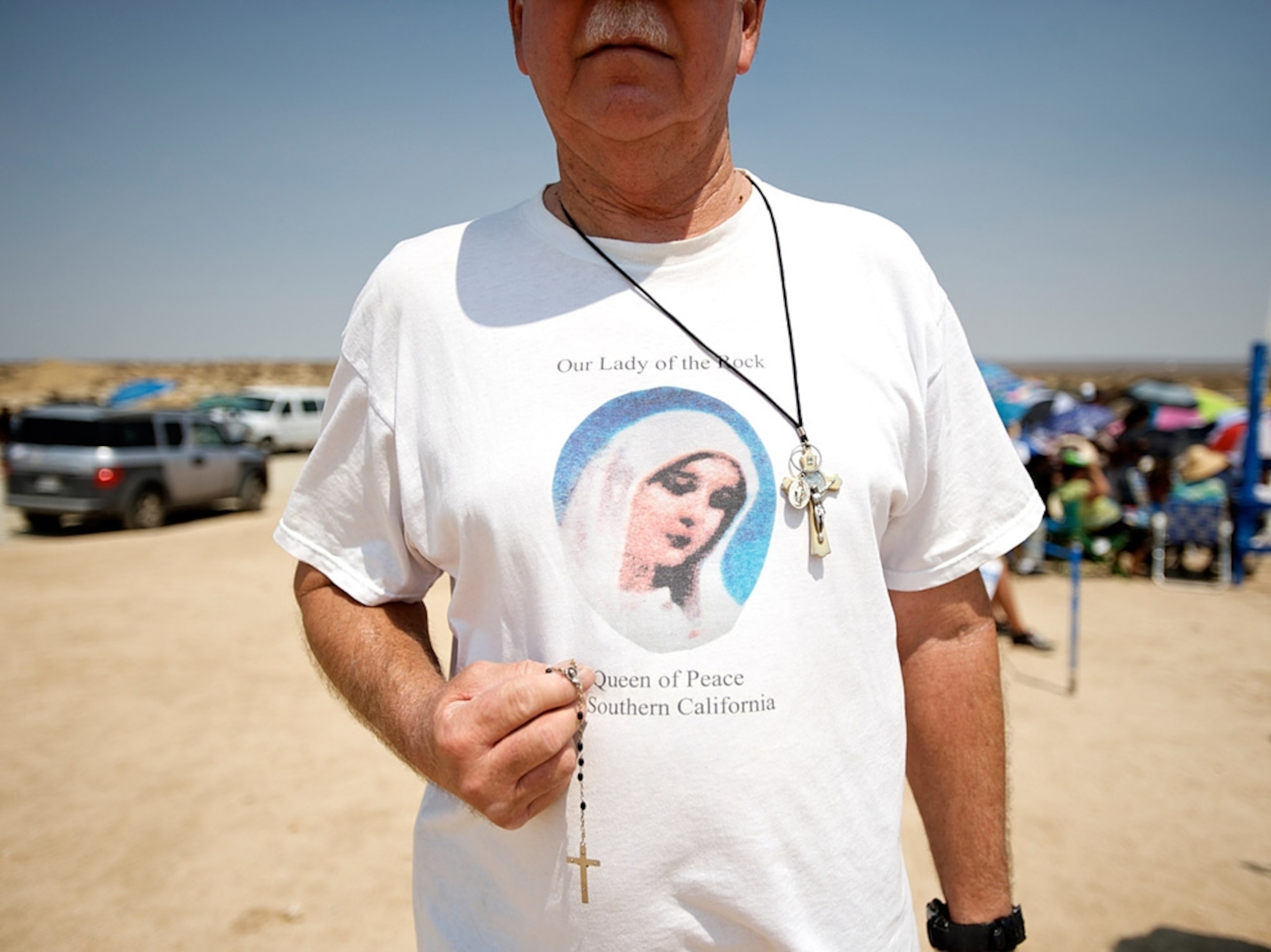 A man wearing a religious t-shirt