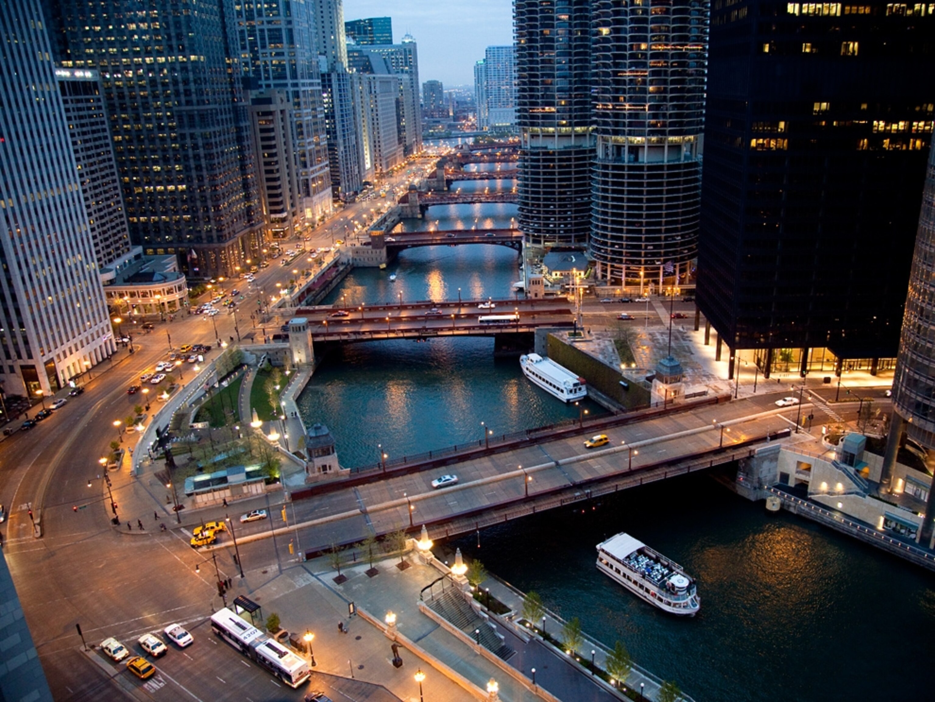 a river running through a city at night