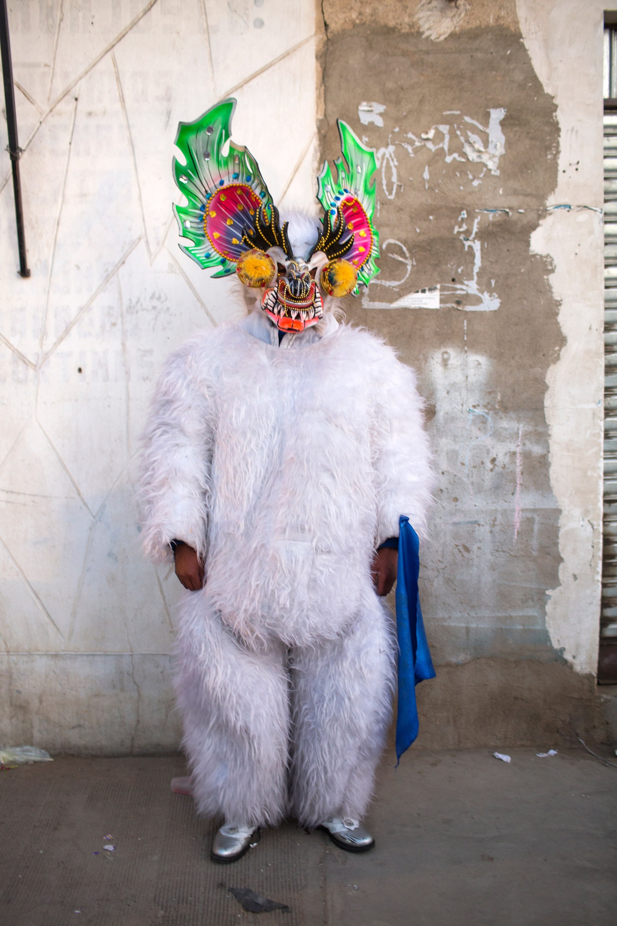 a man wearing a traditional costume in La Paz, Bolivia