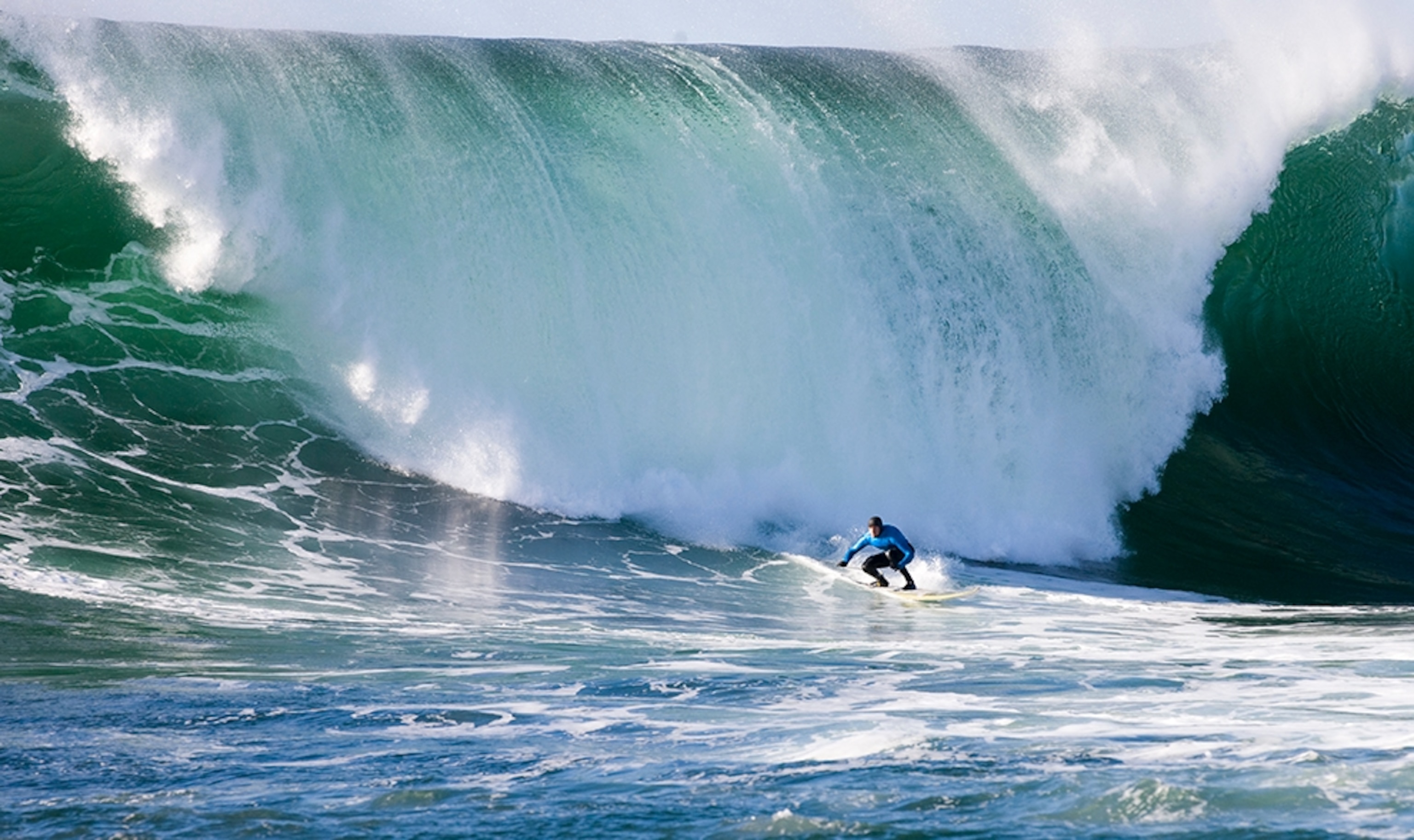 Greg Long surfing Mavericks