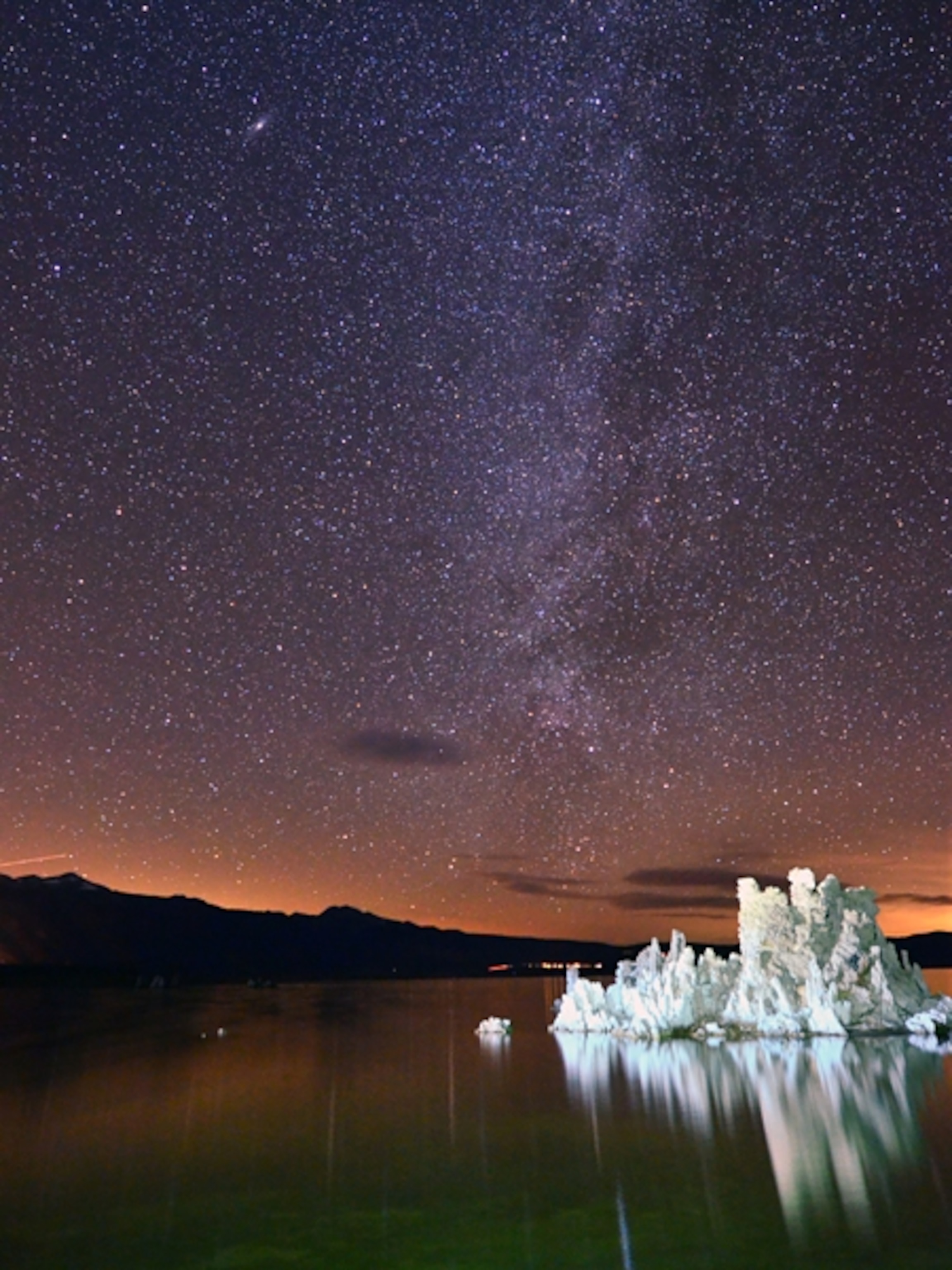 Tufa rock formations in Mono Lake, under starry sky