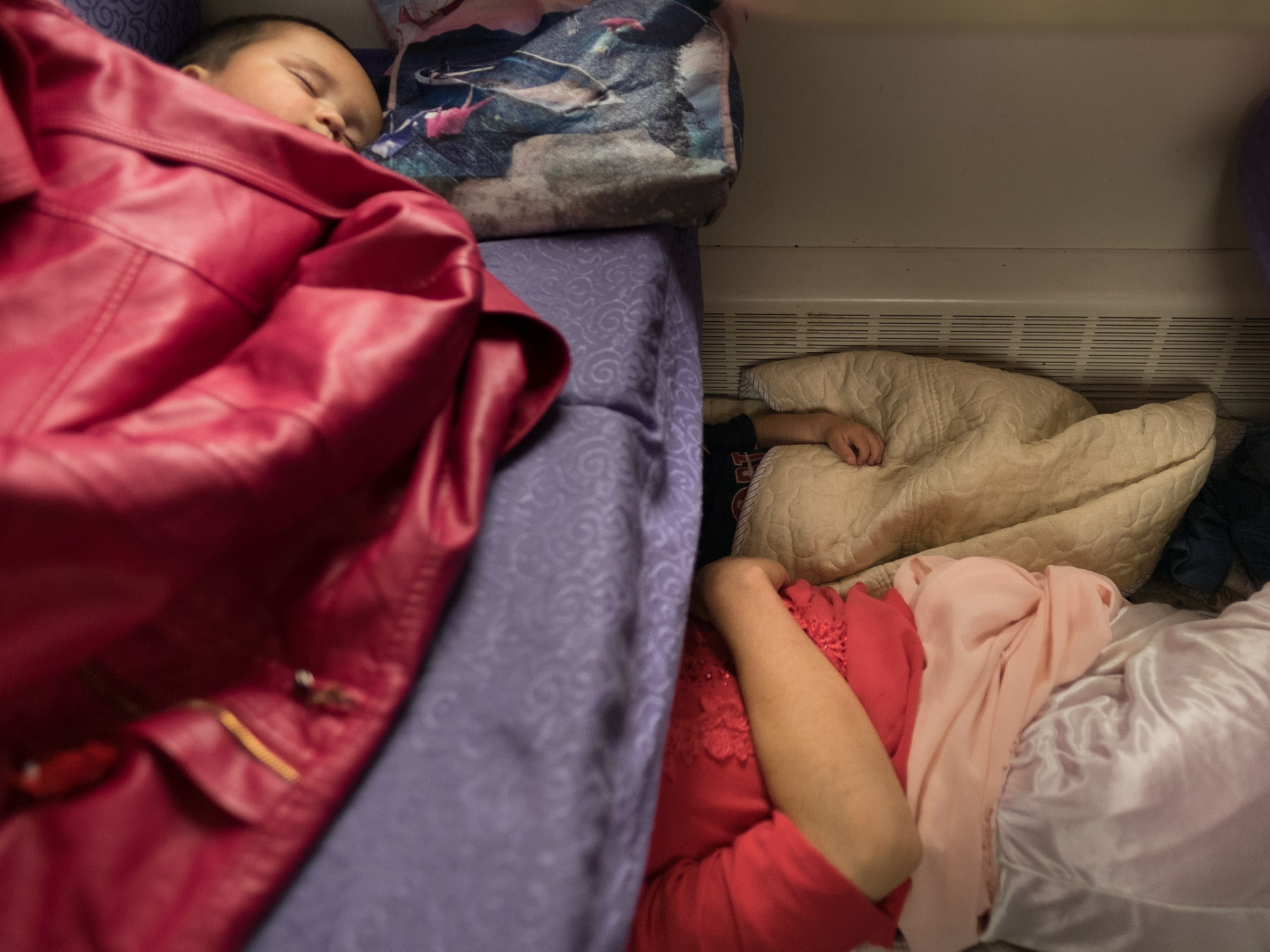 a family trying to sleep