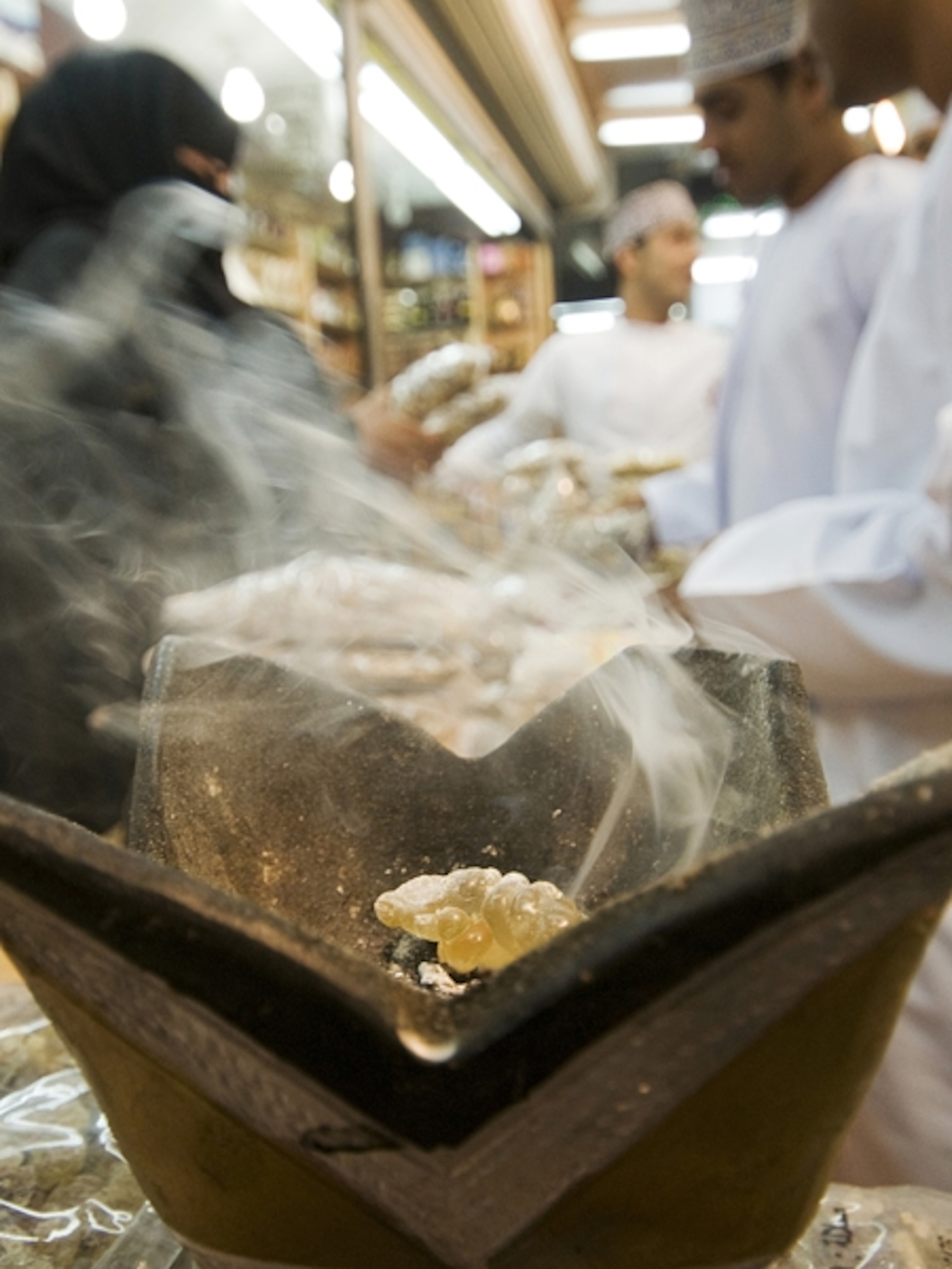 Incense dealer burning Frankincense