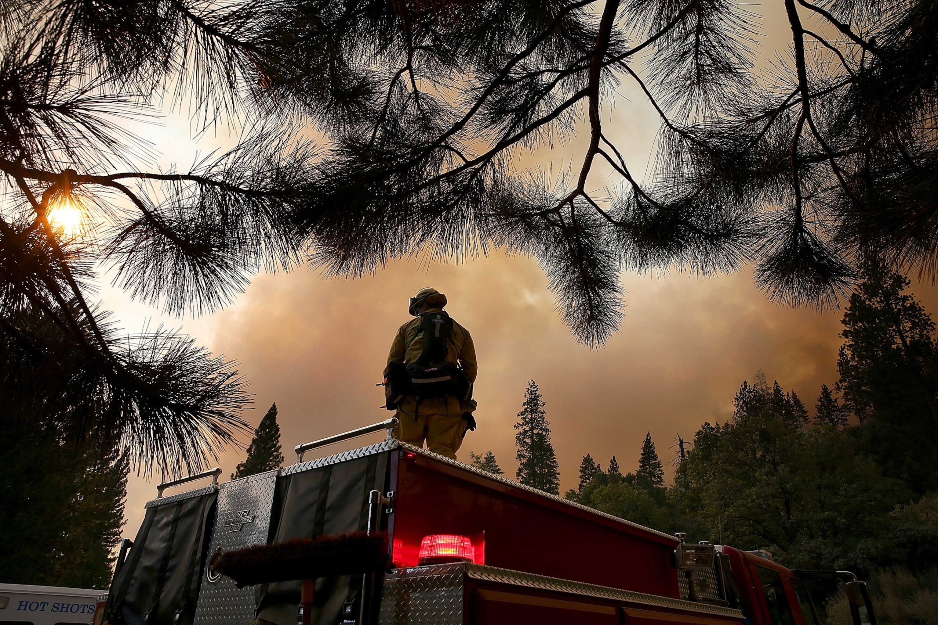 a firefighter monitoring the Rim Fire near Groveland, California