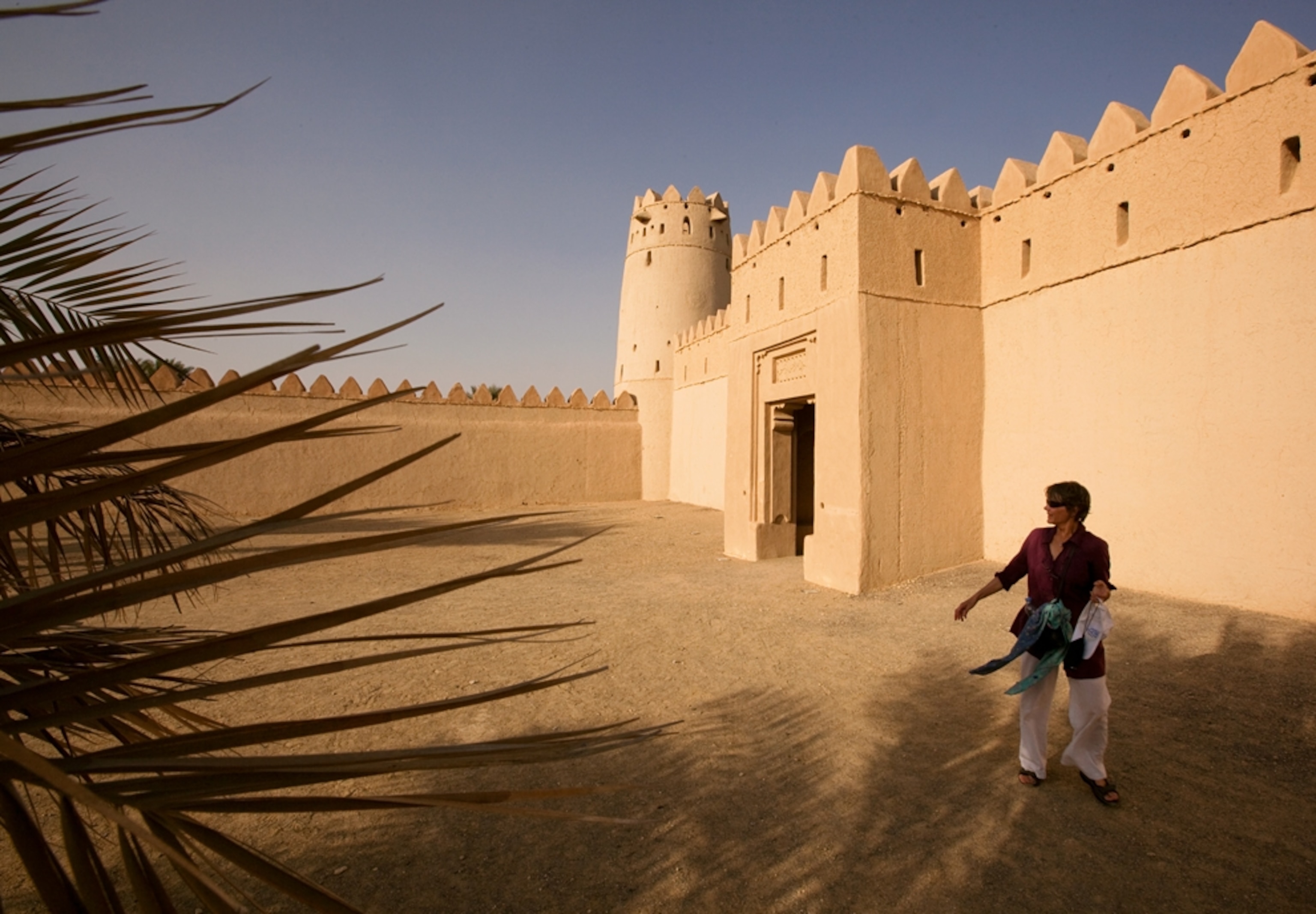 Woman walks at a fort