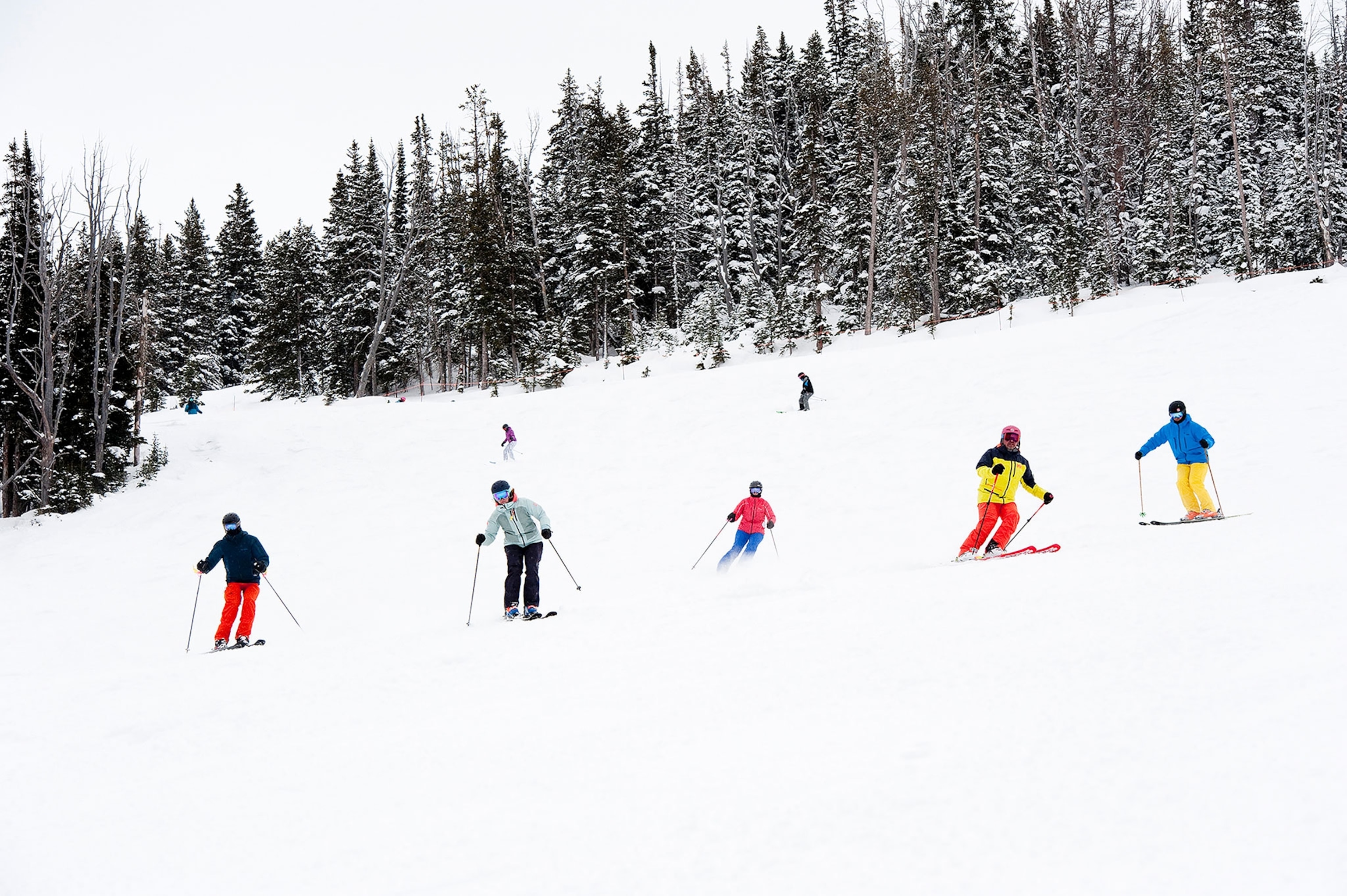 Skiers at Big Sky in Montana, which is part of the Ikon and Mountain Collective passes. The passes have encouraged snowsports fans to visit more than one mountain on a vacation.