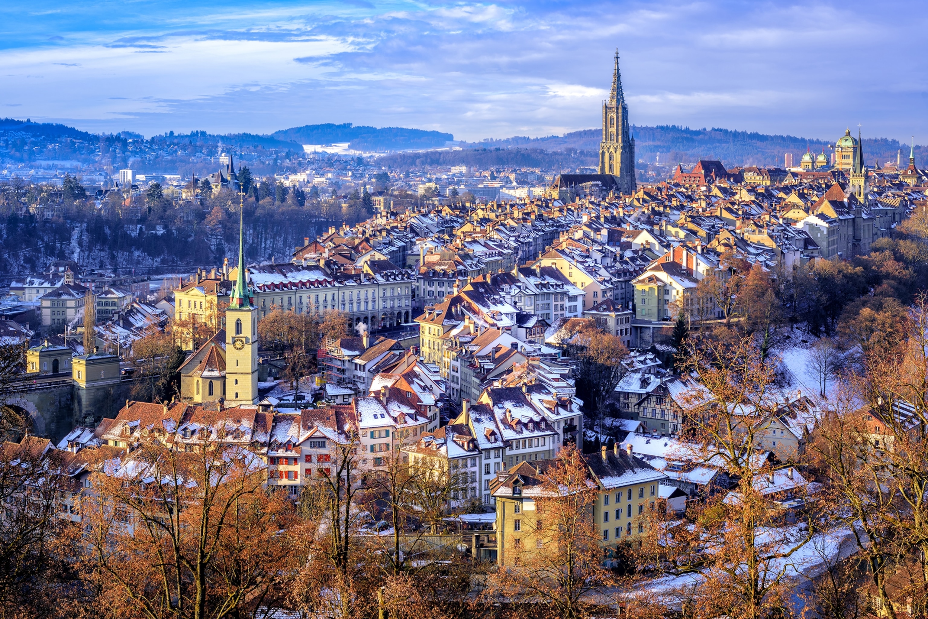 Snow covers the roofs of building in the Old Town of Bern.