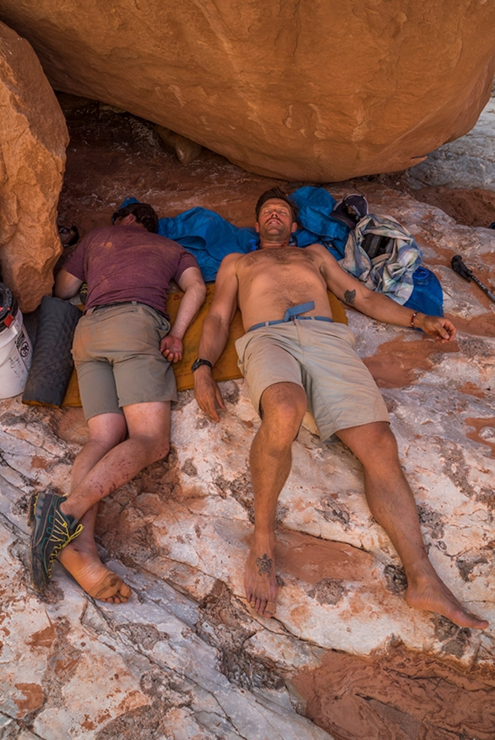 Kevin Fedarko and Pete McBride rest before hiking out early on their first leg of their sectional hike. McBride suffered hyponatremia, dangerously low salt levels. Photograph by Pete McBride