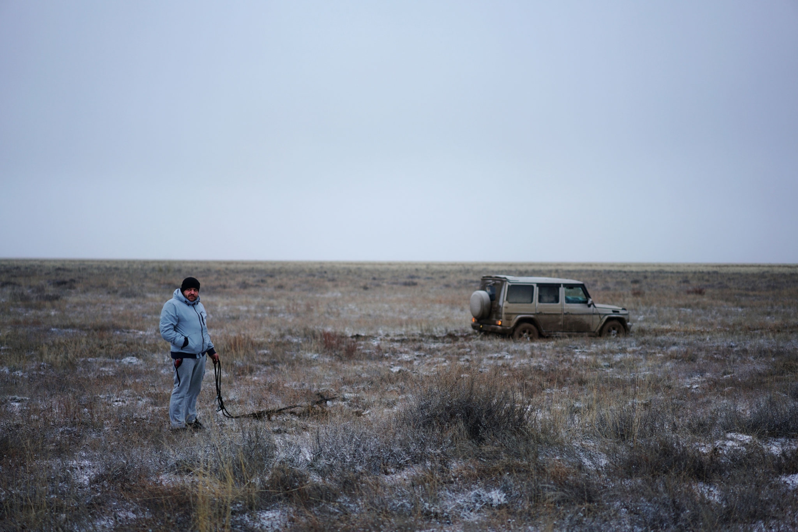 man and broken down truck