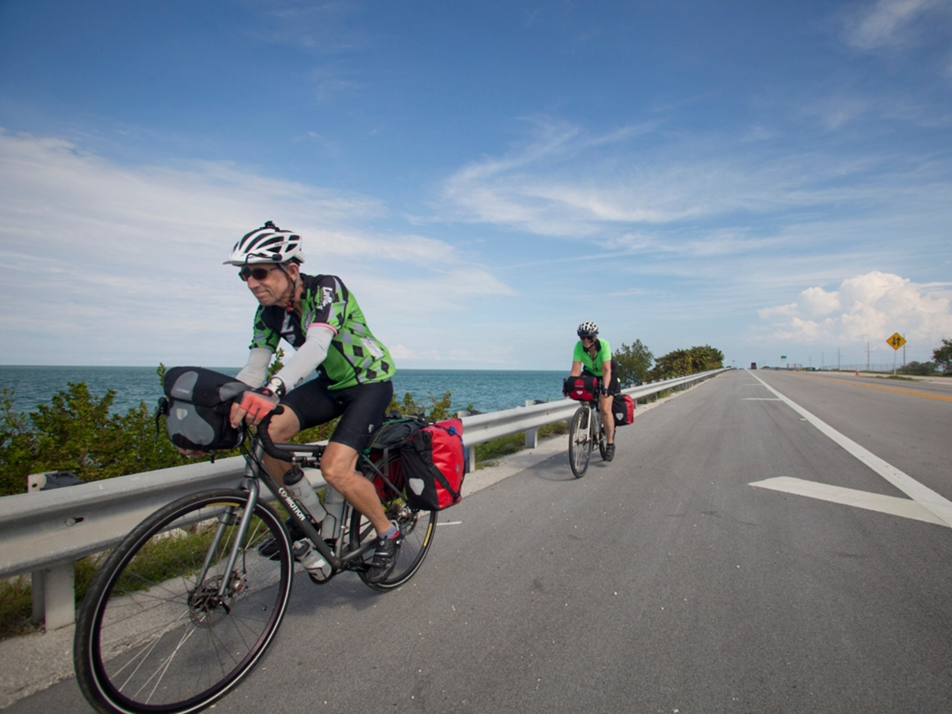 cyclists riding the Overseas Heritage Trail