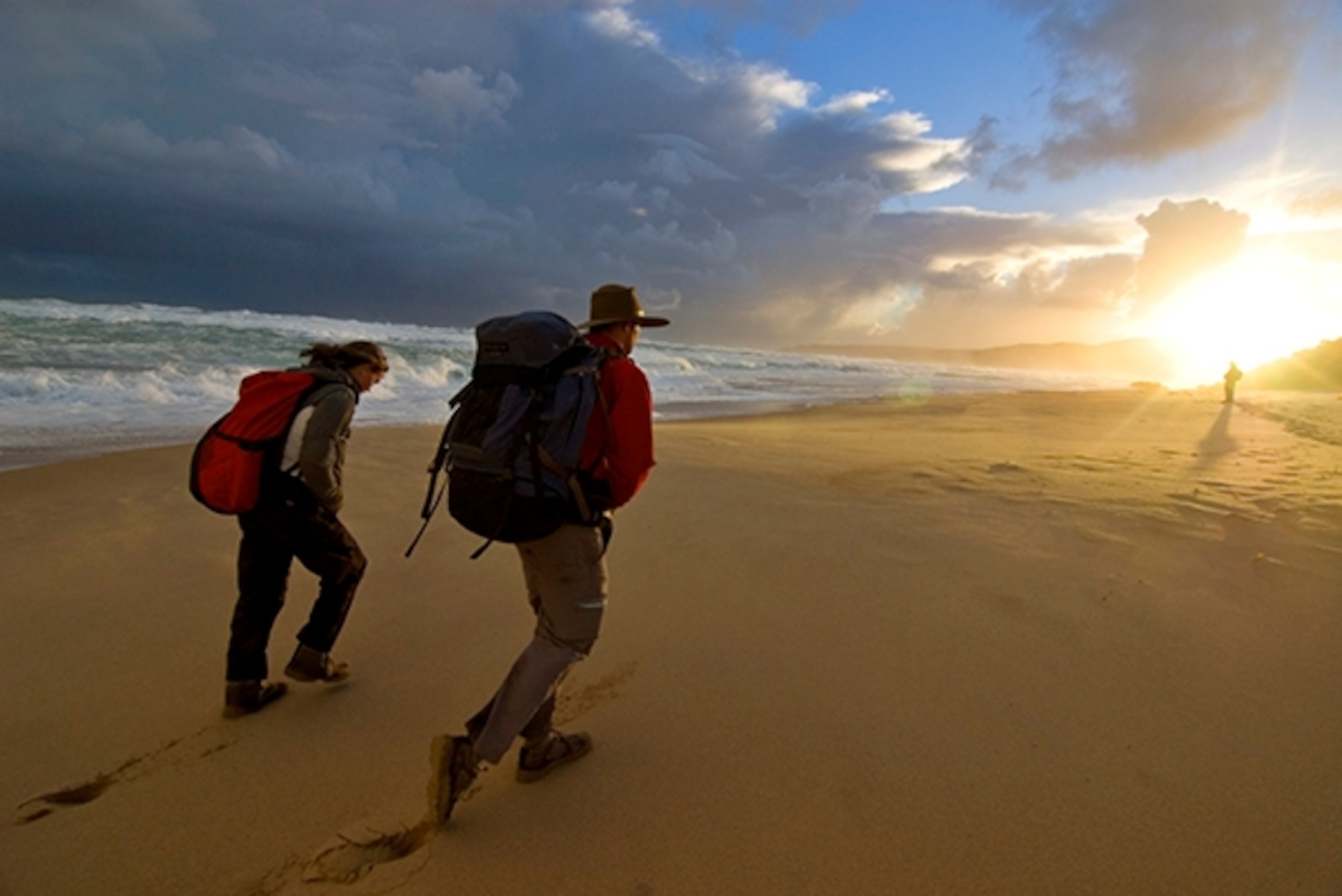 Hikers traverse the sand dunes of Johanna Beach, a popular surf spot in Great Otway National Park. (Photograph by Kerrick James, Corbis)