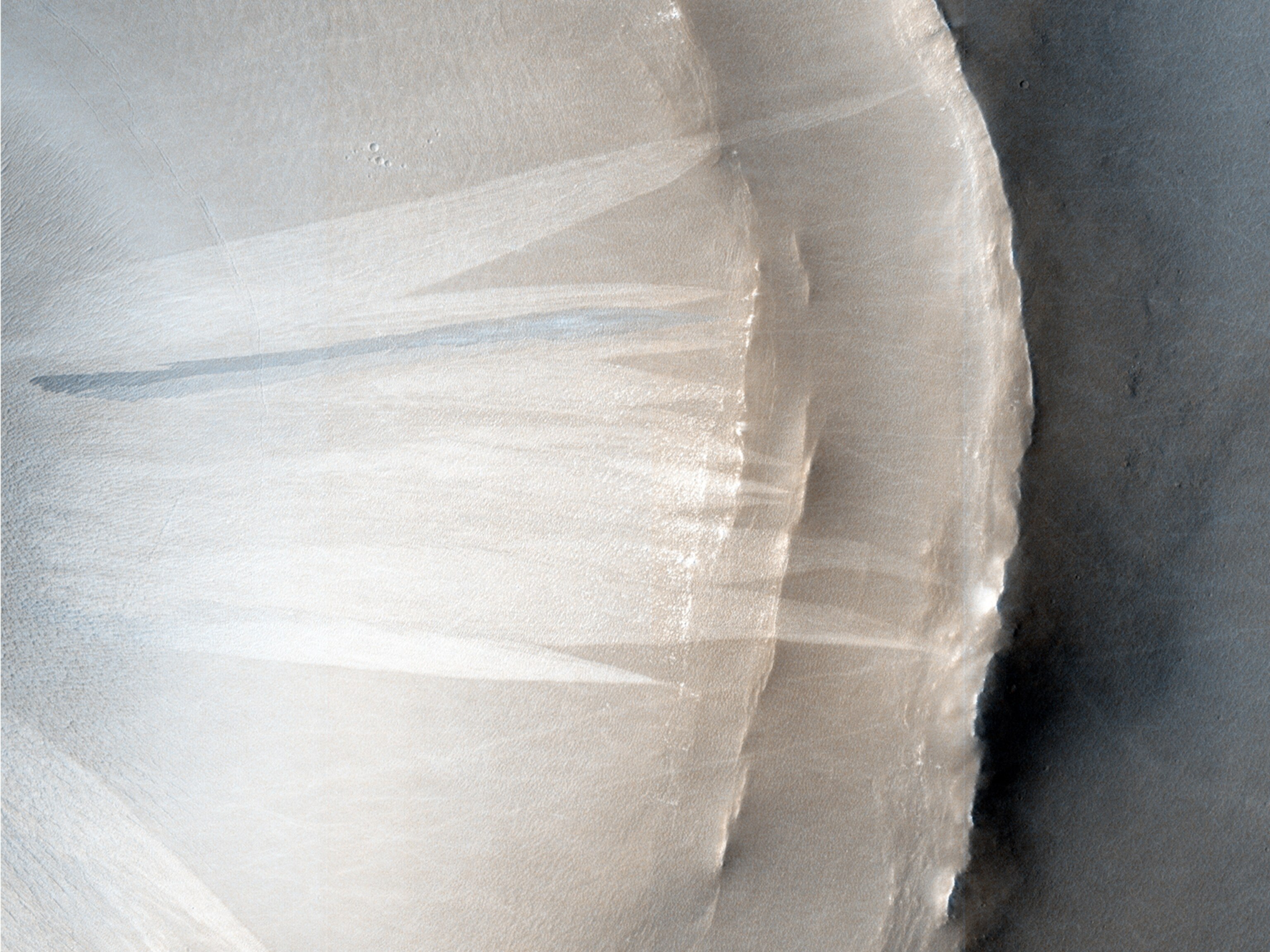 This image contains nearly a million seconds worth of Chandra observing time (purple) along with optical data from the Hubble Space Telescope (red, green, and blue).  The X-ray data reveal hundreds of point-like sources, most of which are X-ray binary systems (XRBs) containing a neutron star or black hole in orbit with a star like the Sun.  Researchers are studying the XRBs in M51, a.k.a. the "Whirlpool Galaxy," to better understand the role they play in the evolution of the galaxy.