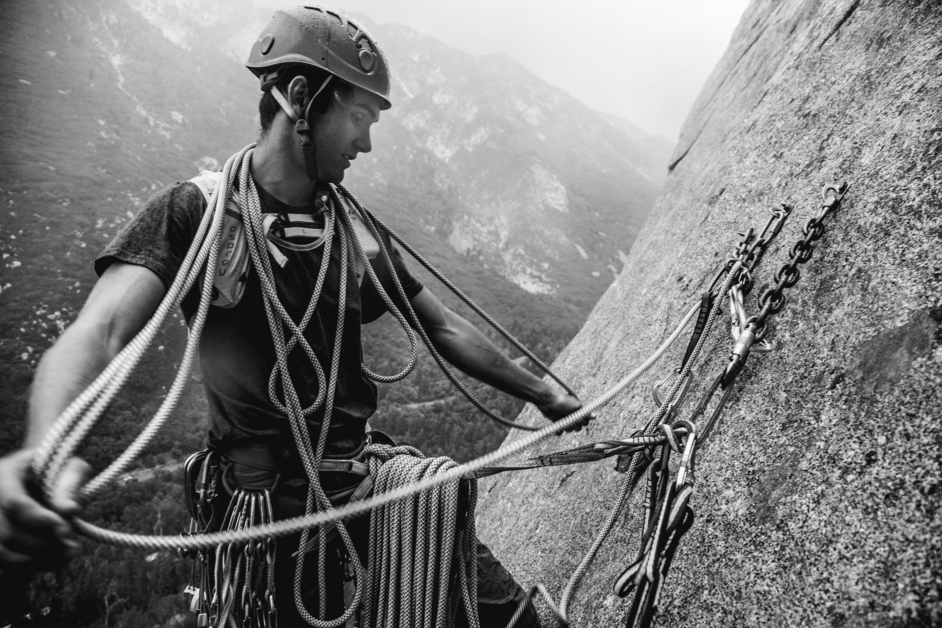 a climber coiling rope in Cottonwood Canyon, Utah