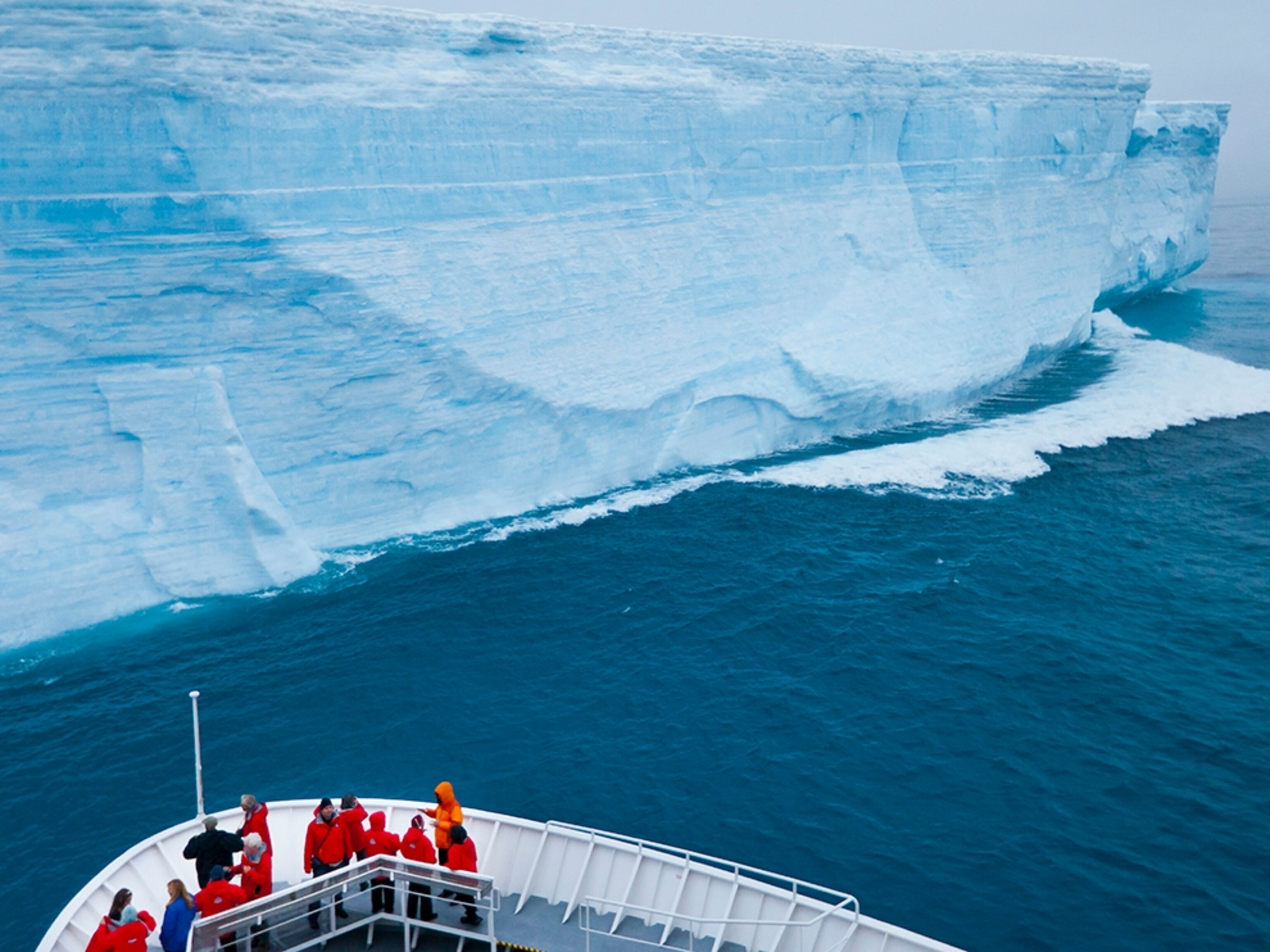 a ship approaching an iceberg