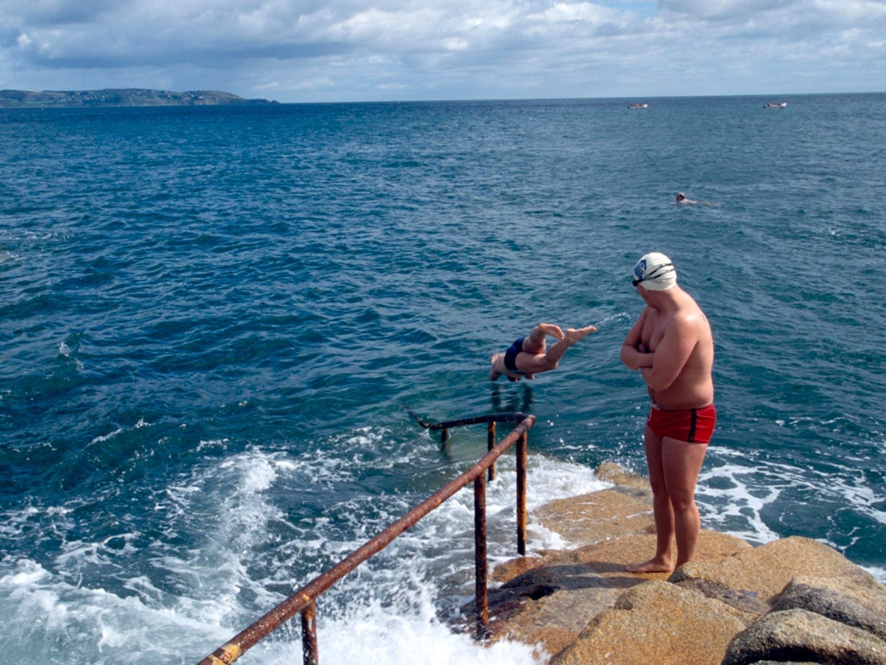 Man diving into sea