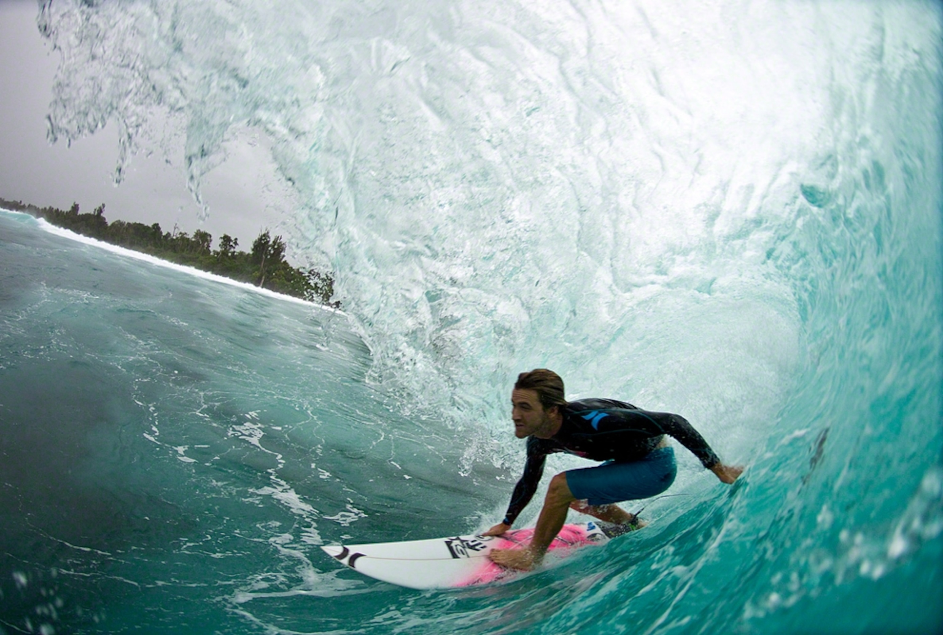 Surfer inside a barrel at the Mentawai Islands in Indonesia