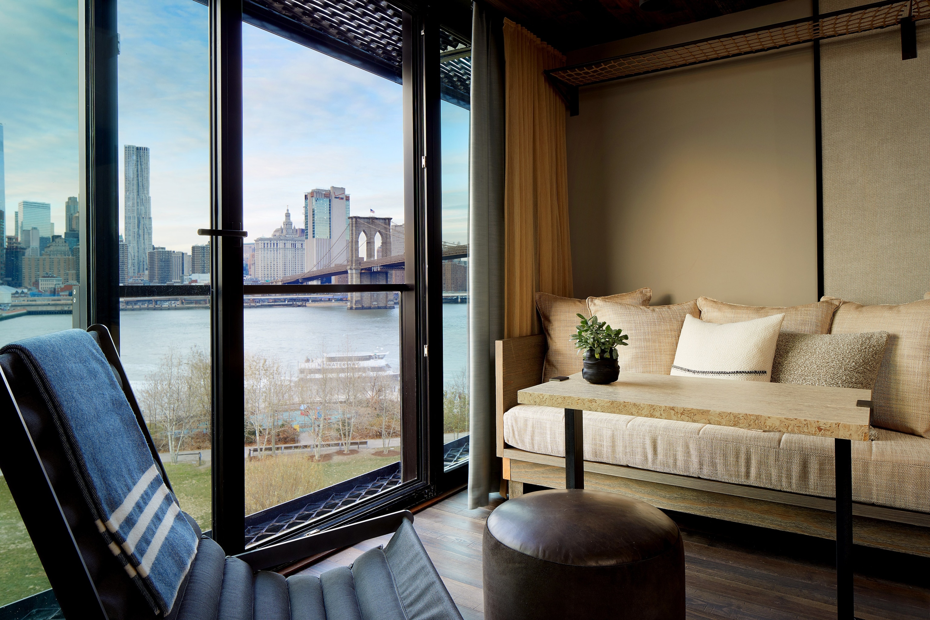 1 Hotel Brooklyn Bridge room with a view of the Brooklyn Bridge through the window