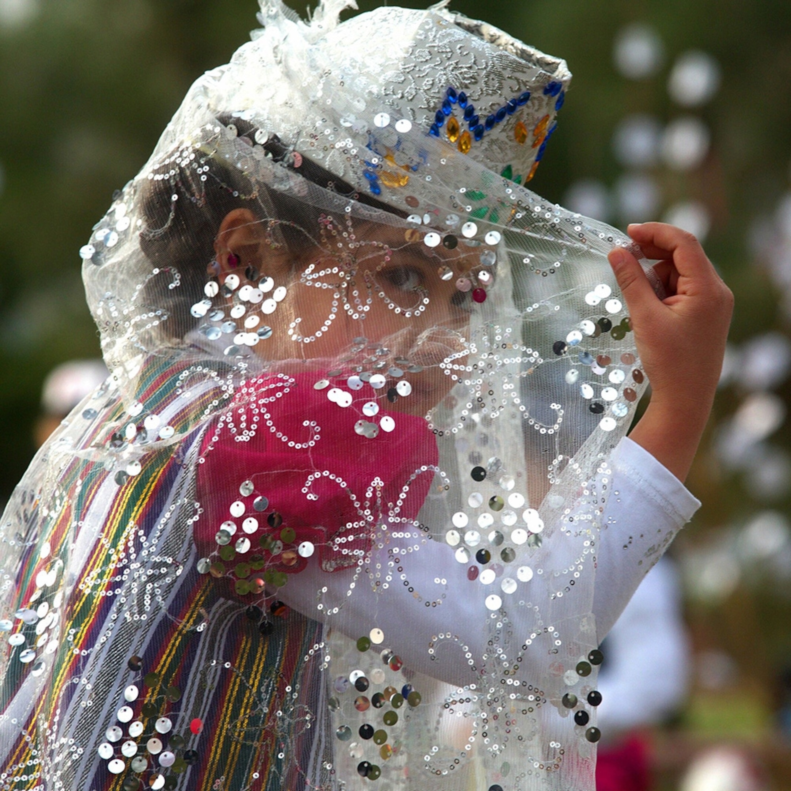 A girl dressed in traditional clothing during 'Navruz' celebrations in Khujand, Tajikistan.