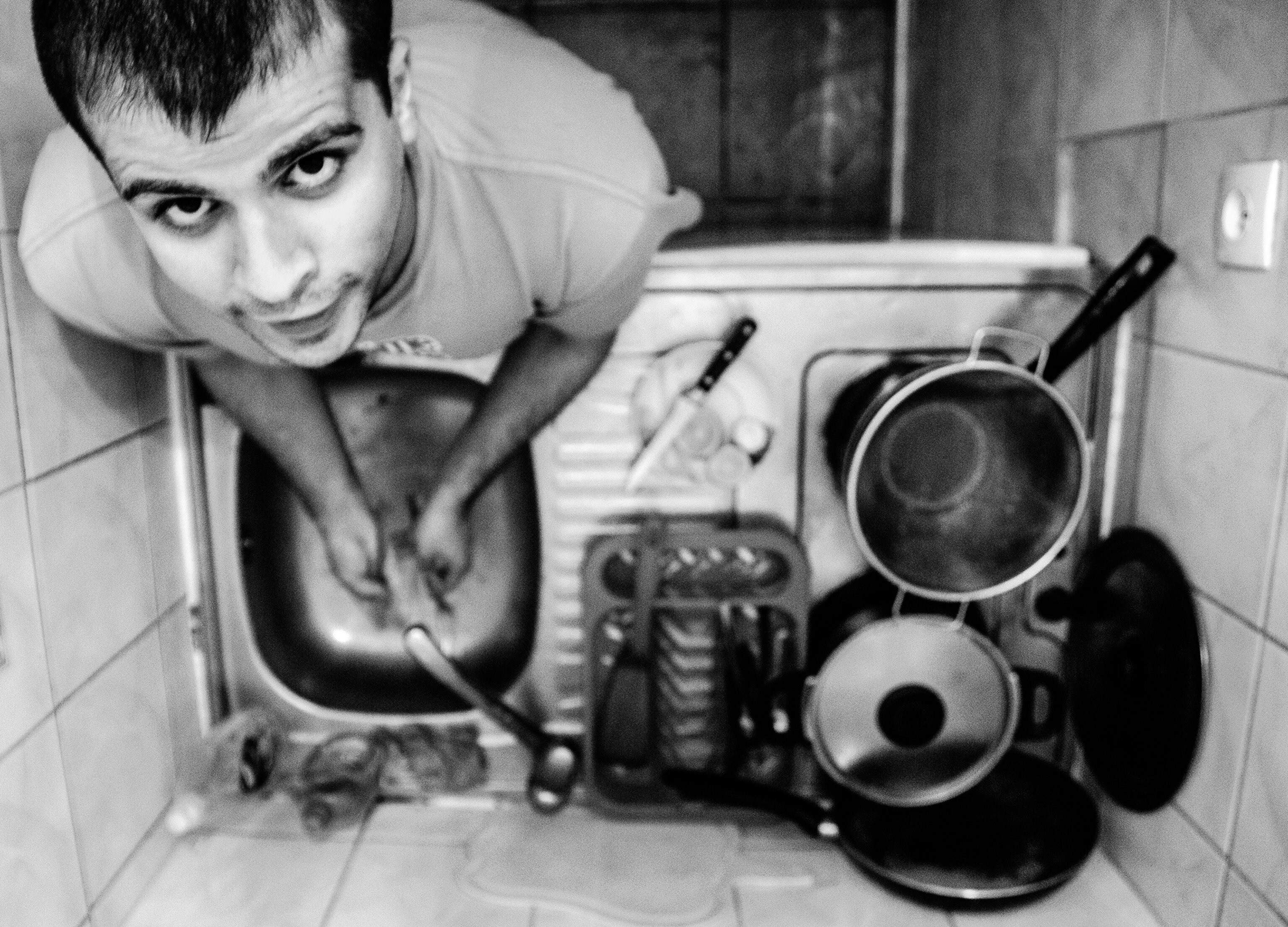 This student lives in the old Parisian apartment where dozens of students who came to Paris for education lived since 1980s.