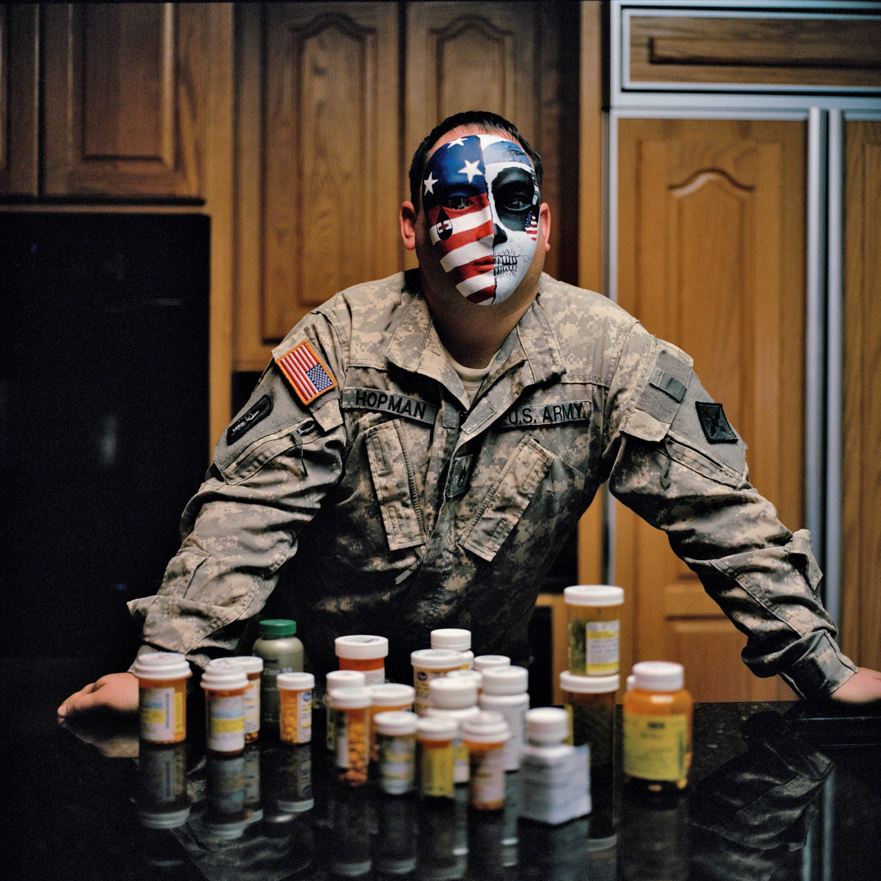 a soldier with a mask on and medicine bottles