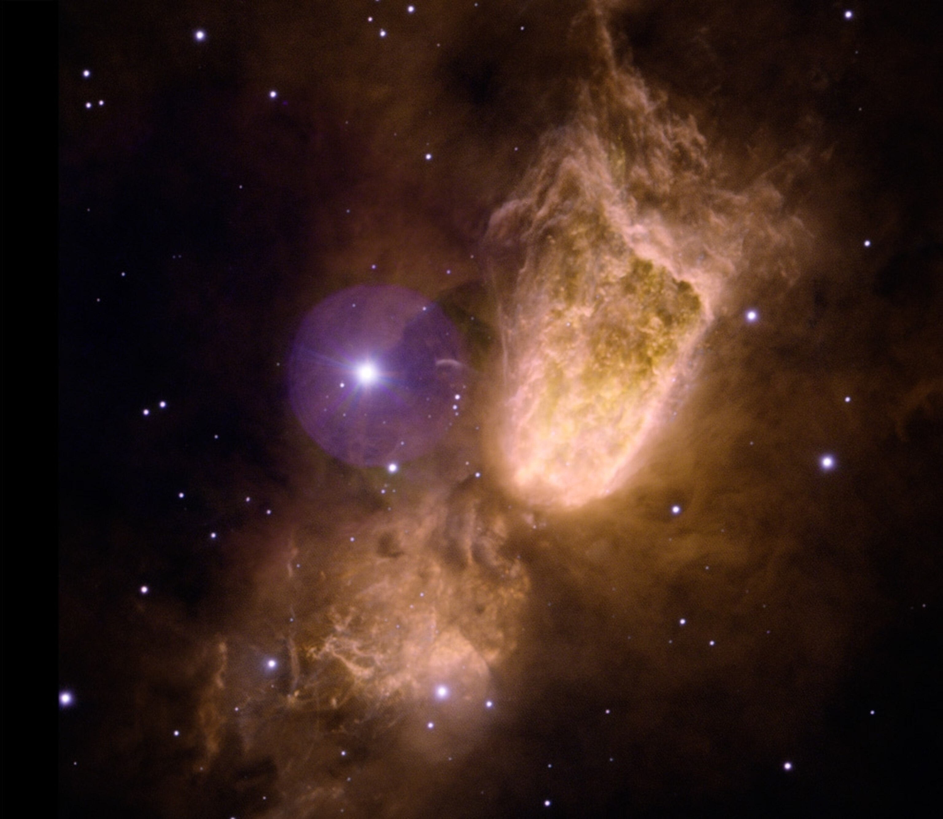A new color picture of the hourglass-shaped nebula Sharpless 2-106