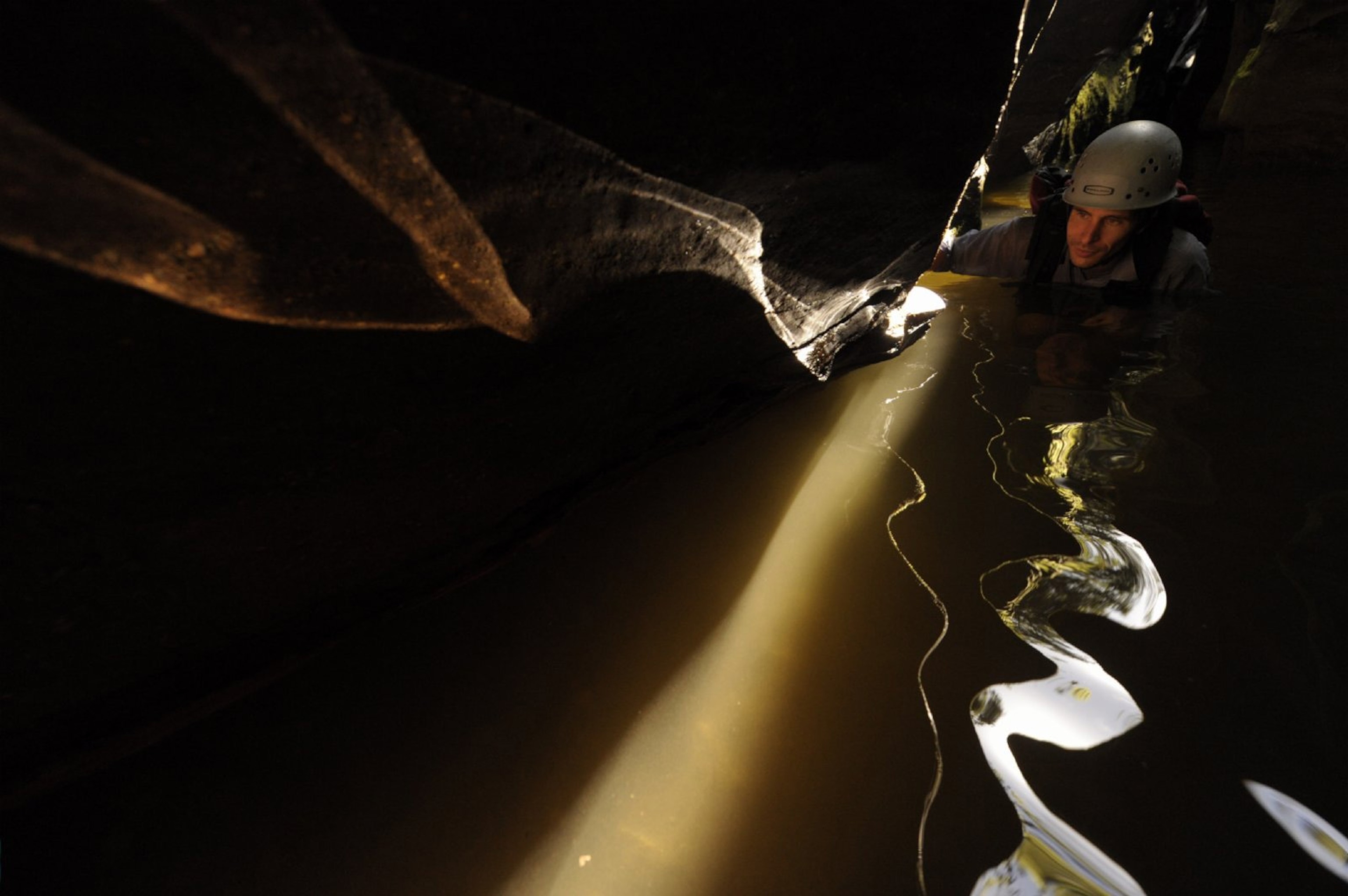 a canyoneer exploring Freshwater Creek Canyon