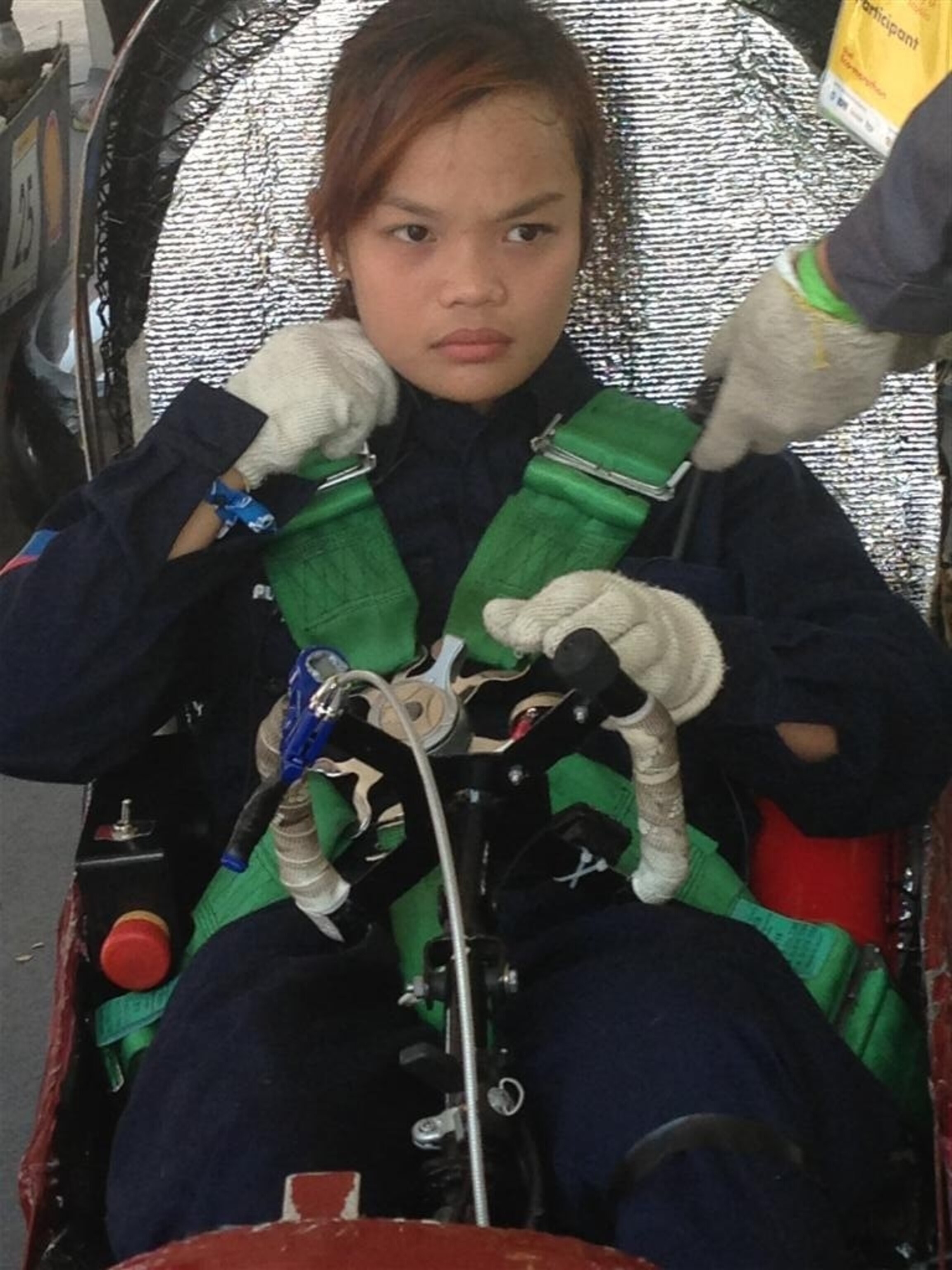 A female student driver from Technological Institute of the Philippines tests out the team car. Photo by Imelda V. Abano.