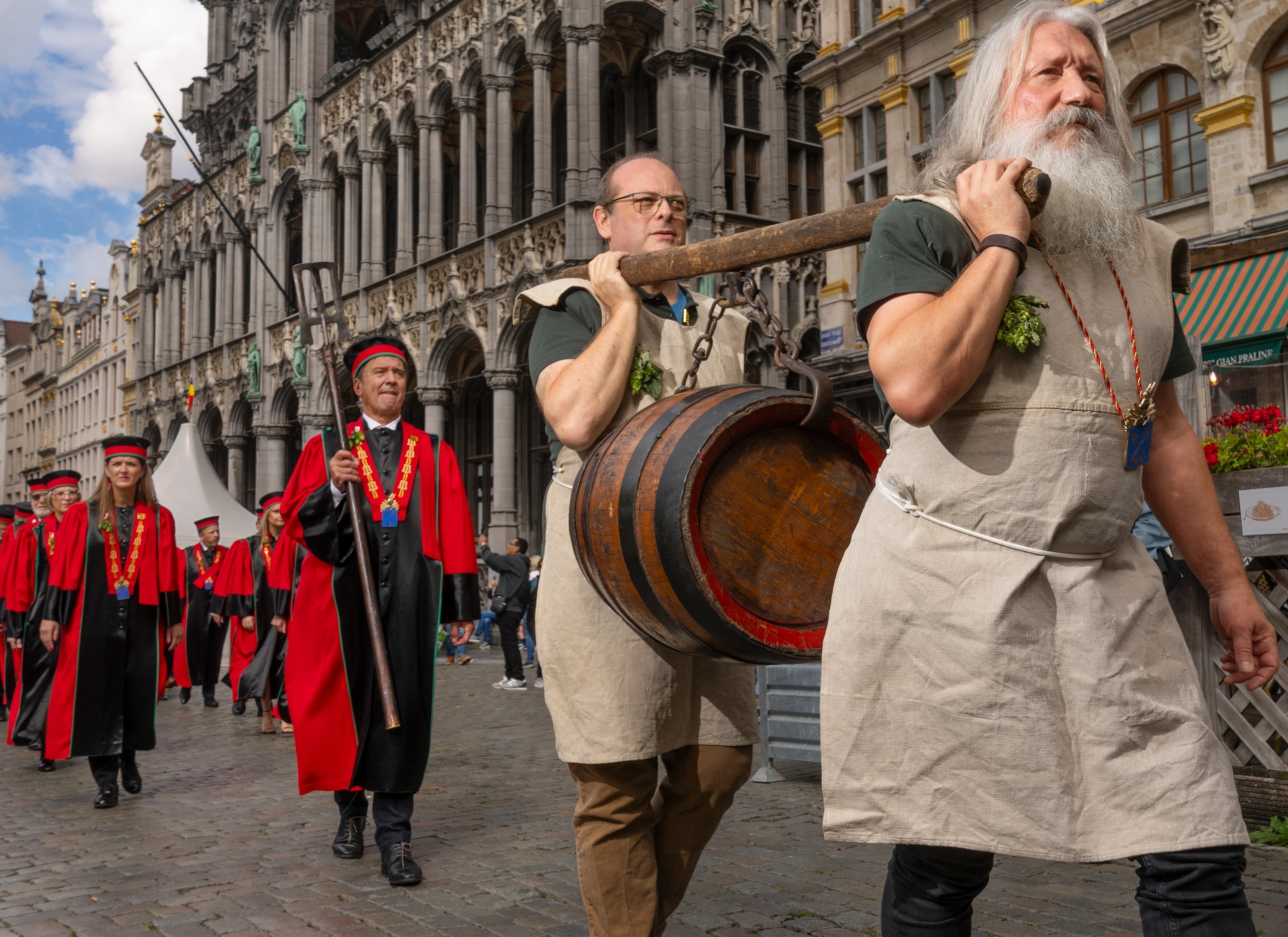 A barrel of beer gets paraded to a ceremonial blessing during the annual Belgian Beer Weekend in Brussels.