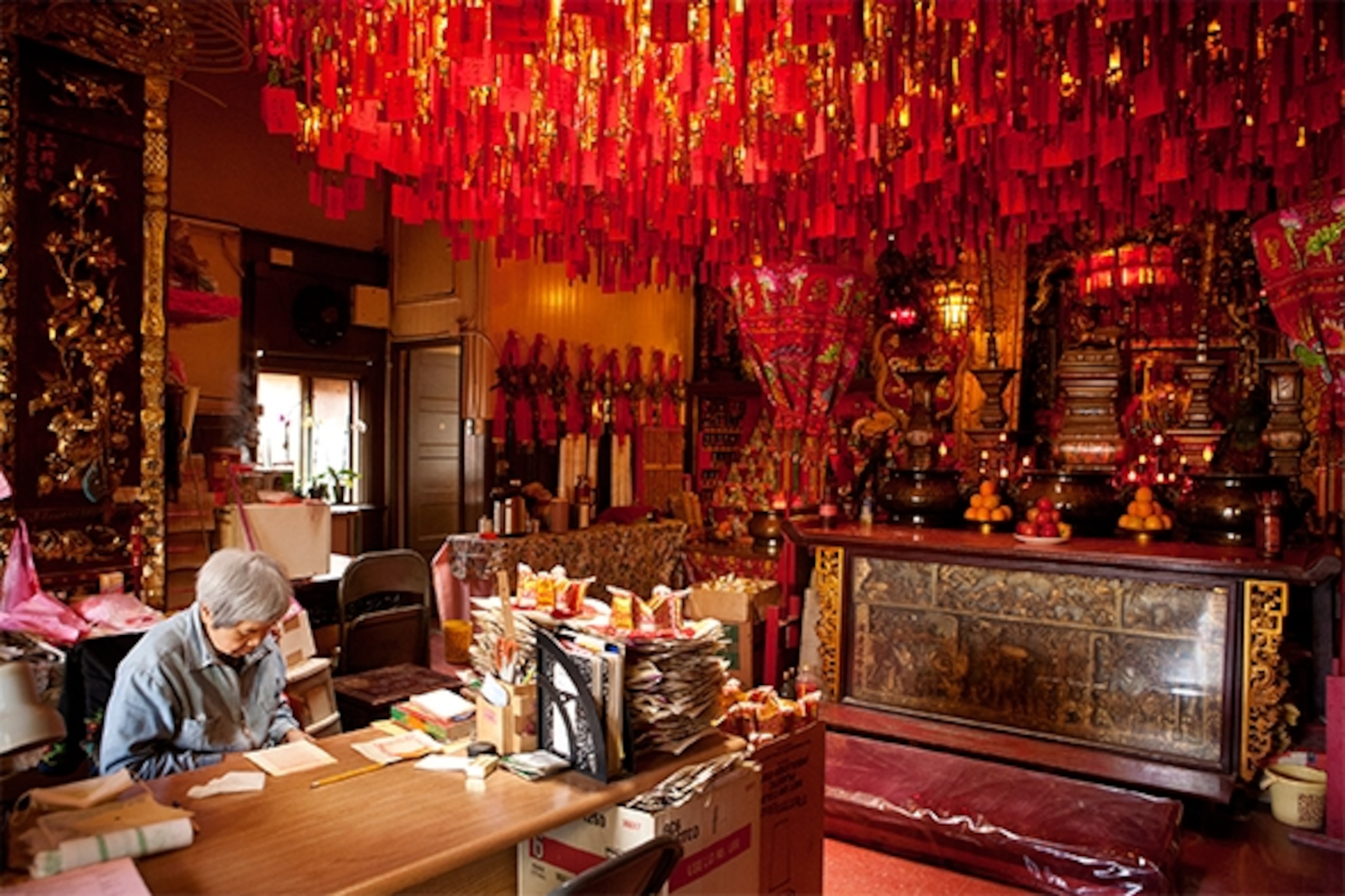Tucked away on the fourth floor of an ornate building on Waverly Place, Tien Hau Temple is the oldest Taoist/Buddhist temple in the U.S. Tien Hau, Chinese goddess of the sea, is believed to protect fishermen; in the late 1800s shrimp fishing was a major commercial enterprise for Chinese immigrants in San Francisco. (Photograph by Catherine Karnow)
