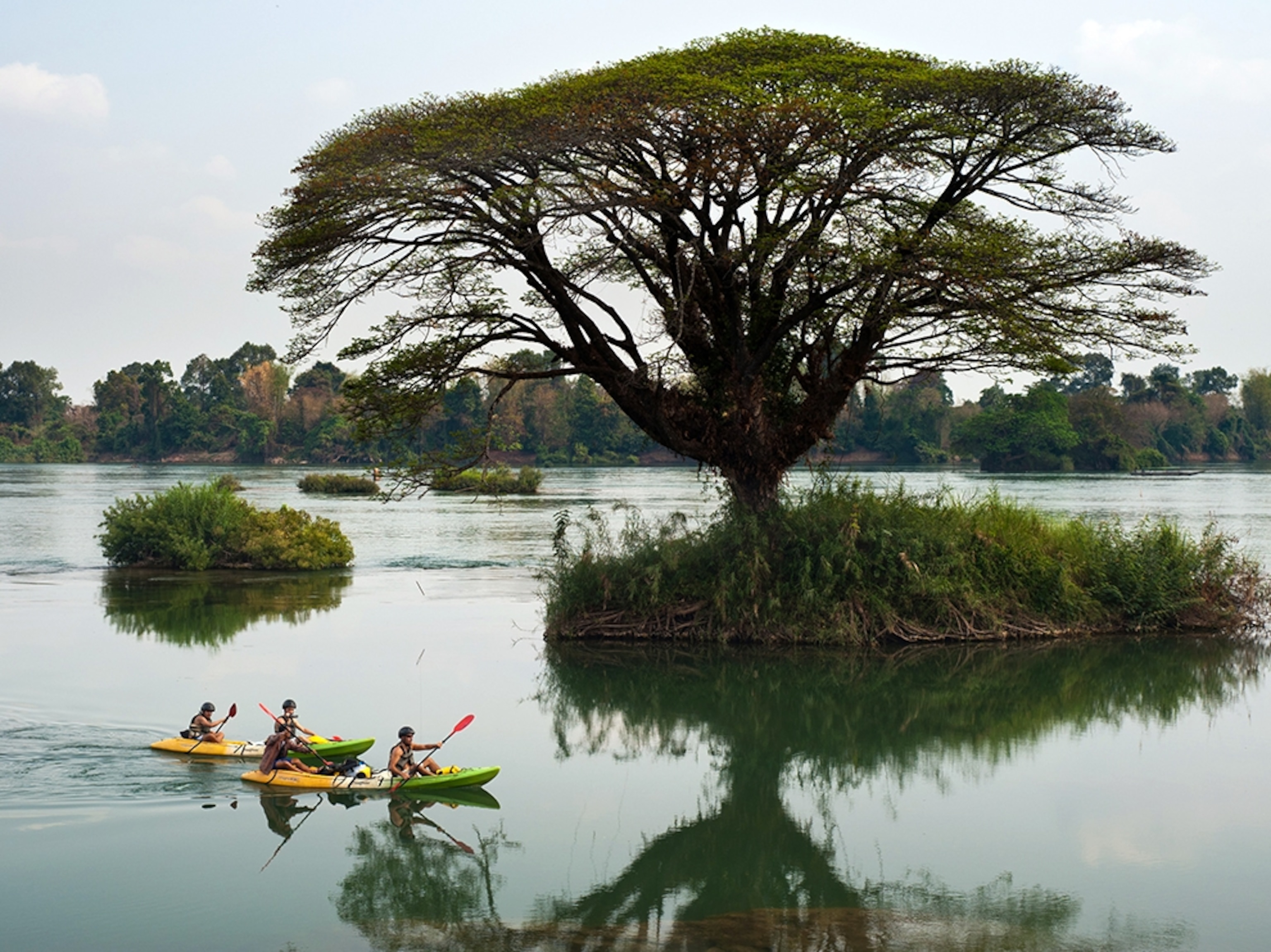 kayakers on the Mekong River, Laos