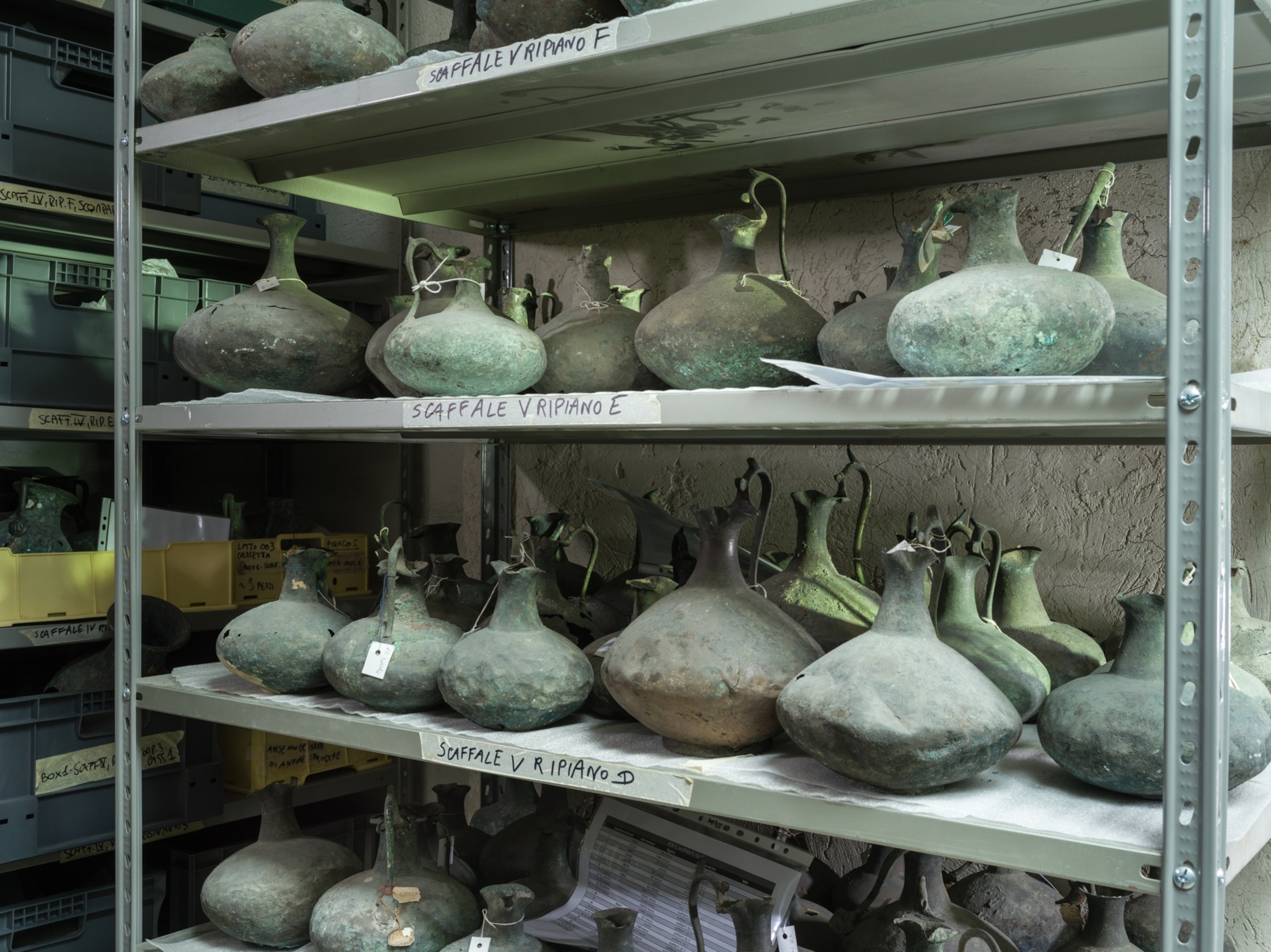 A shelf of pottery artifacts