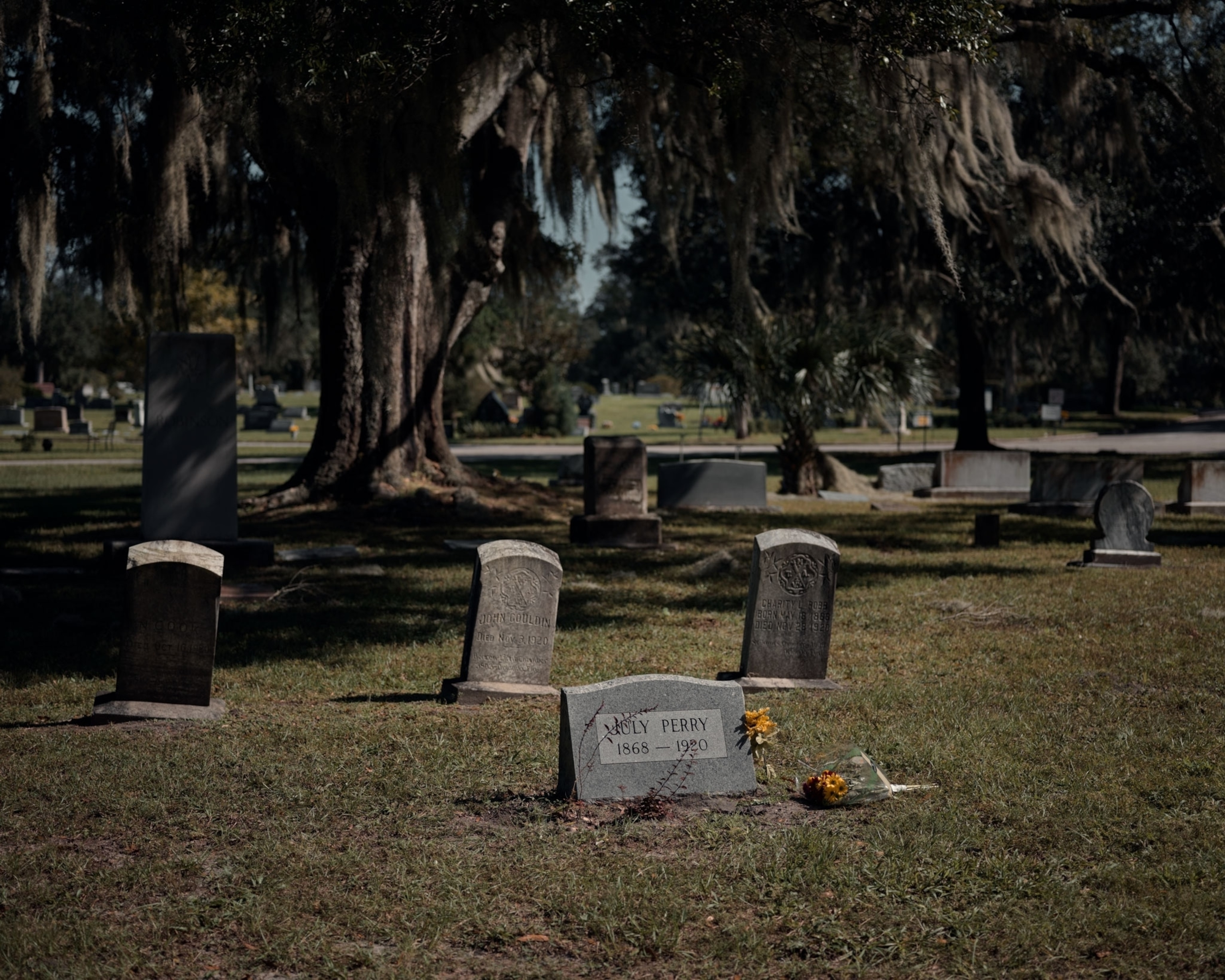 A tombstone of a person killed in a massacre against Black voters 100 years ago