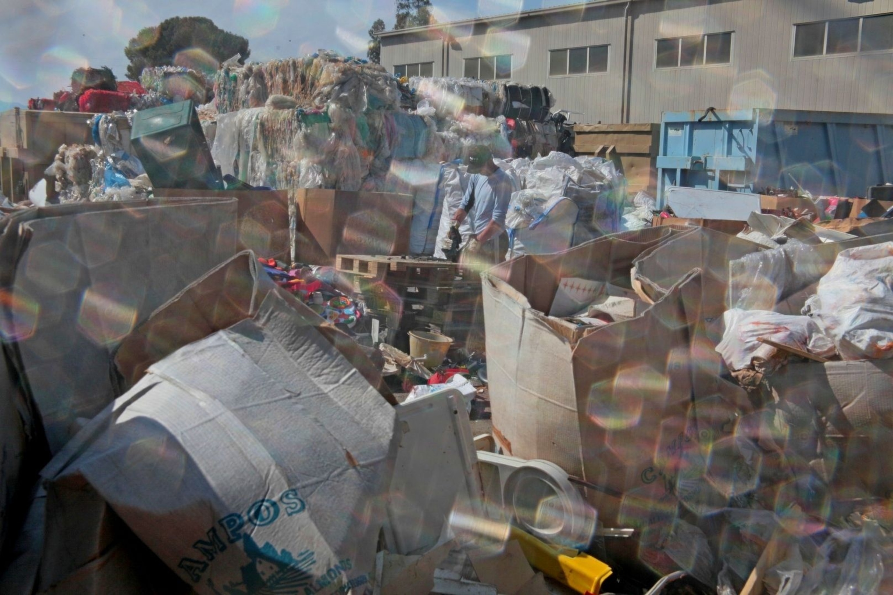 Piles of trash wait to be sorted at Reggio Maceri.