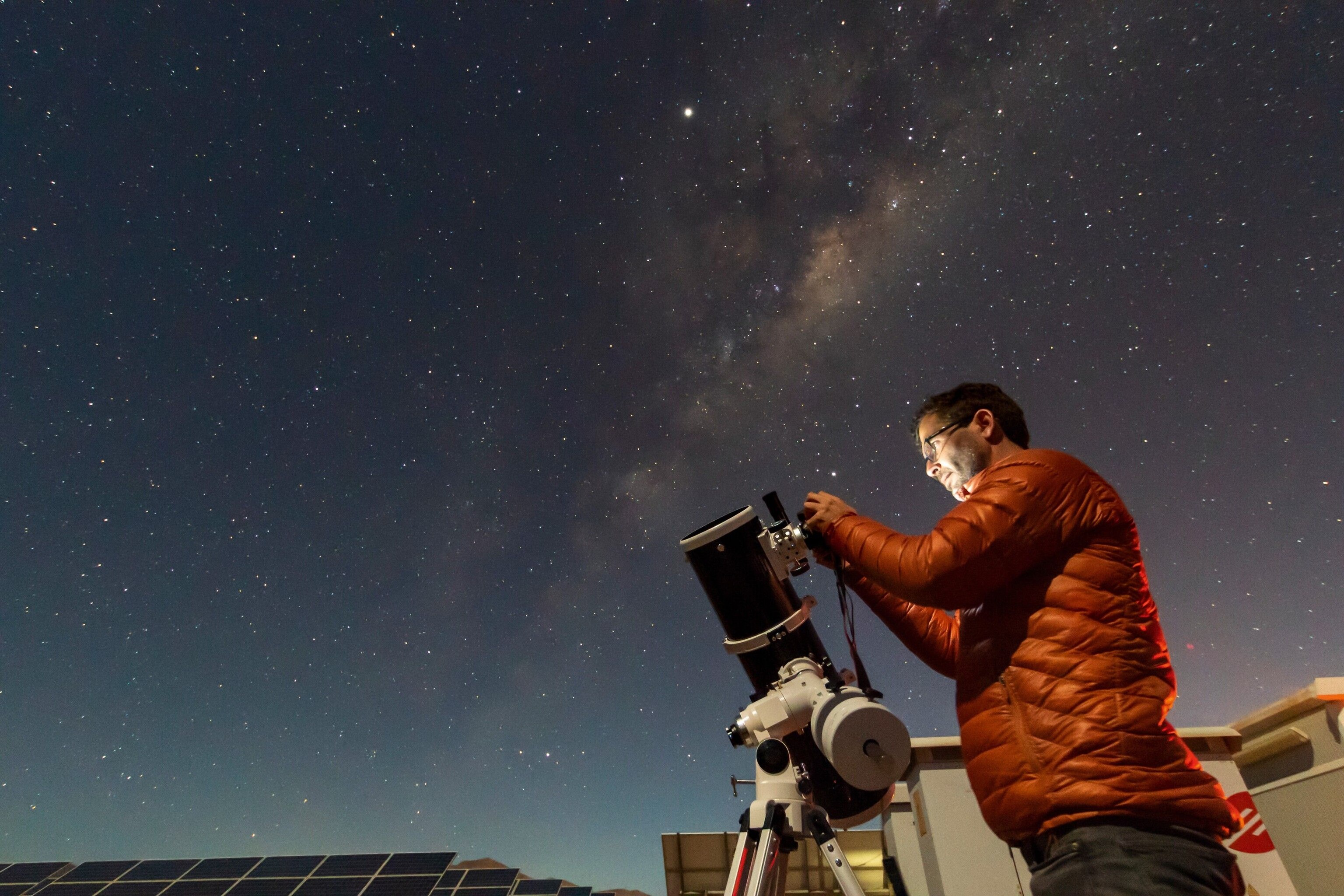 An astronomer observes the Milky Way over Chile’s Atacama Desert, renowned for the clarity of its night skies.