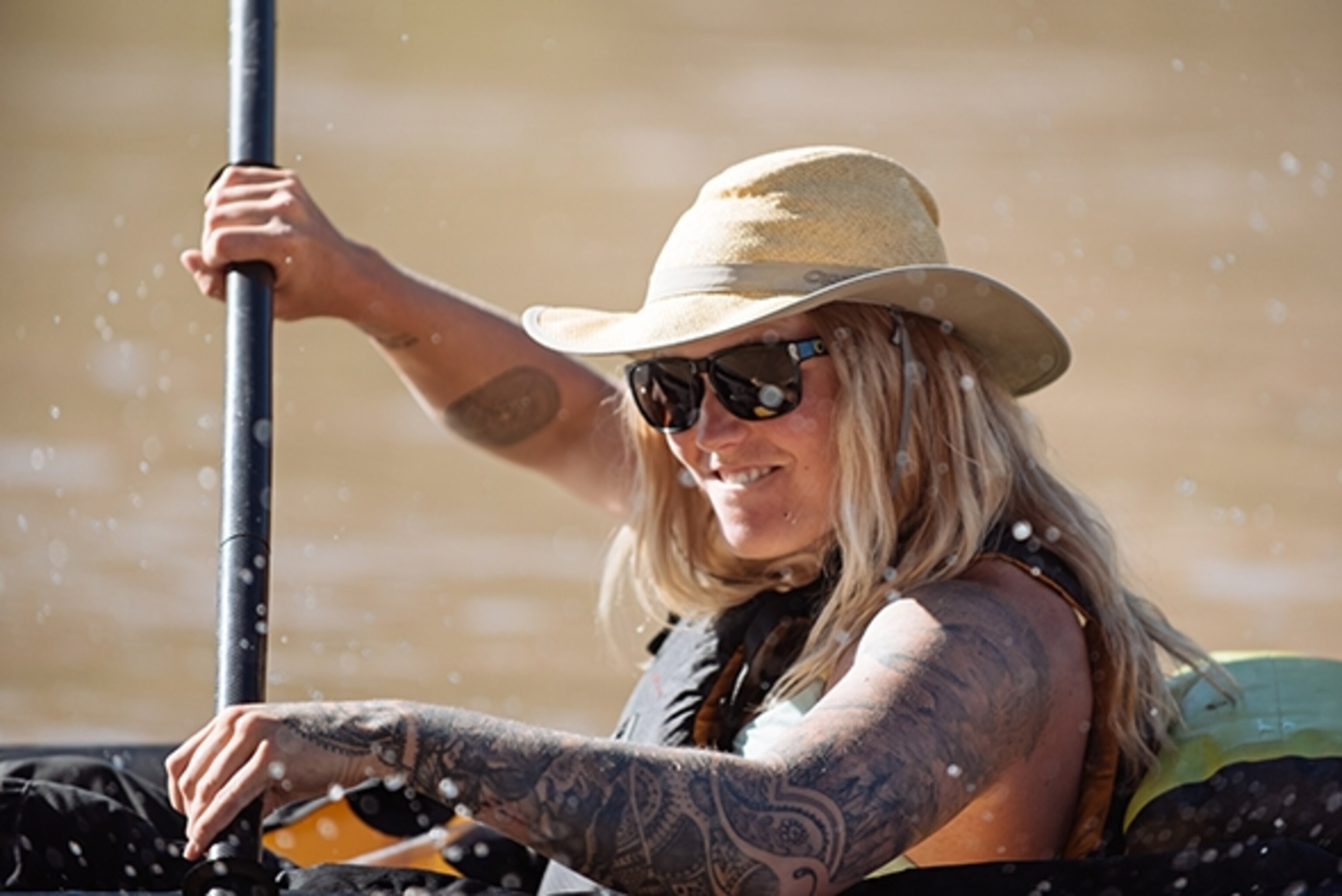 Kalen Thorien, a professional skier, paddles her packraft on the Colorado River; Photograph by Max Lowe