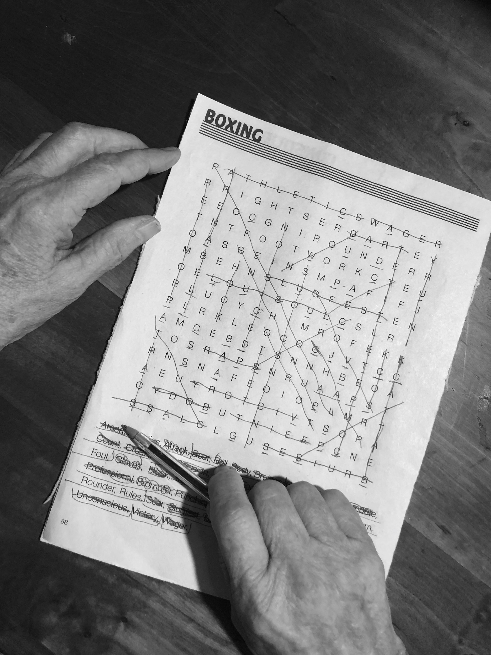 A woman doing a word puzzle game